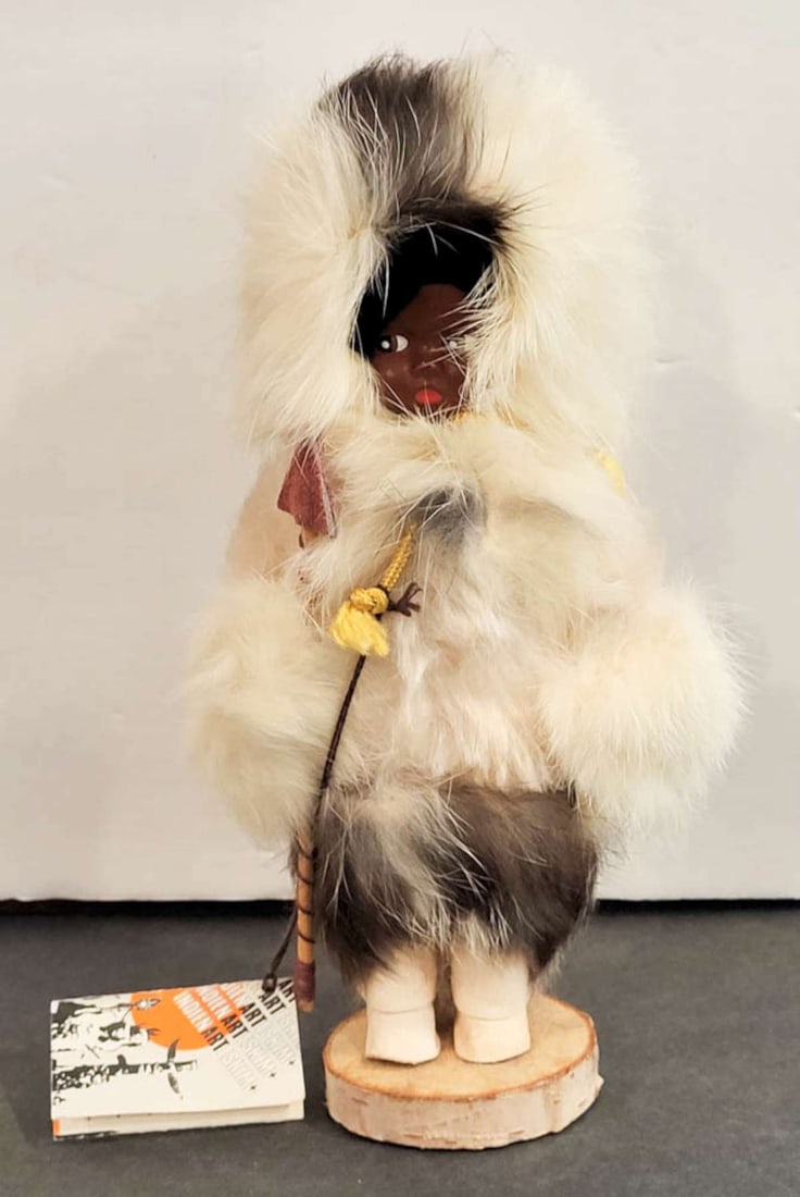 vintage Native or ethnic doll with fur: paper label for Indien Art Eskimo, crafted in Canada, dark skinned plastic doll with white and greyish brown real fur, ca. 1990'sroughly 8" tall including fur hat