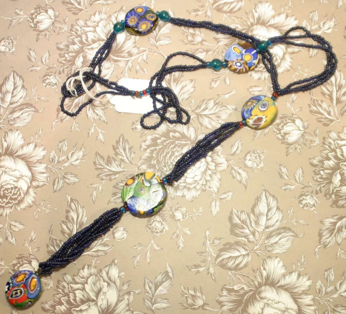 vintage estate jewelry: Murano glass Sautoir necklace: according to consignor this was purchased by her mother in the late 1930's in Italy, so this is most likely an Art Deco period Murano millefiori glass bead Flapper necklace with flattened