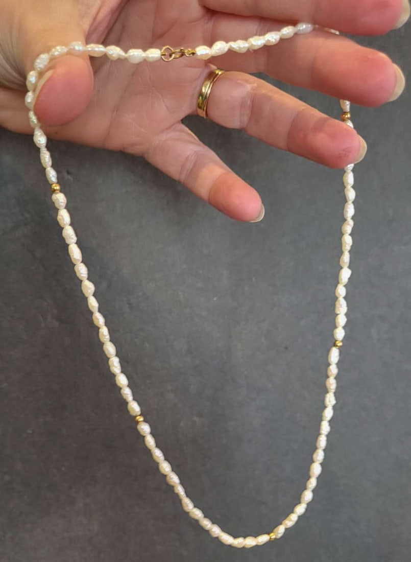 vintage estate jewelry: pearl necklace: 14K marked clasp and likely (but untested) also gold spacer beads necklace with string of freshwater pearls