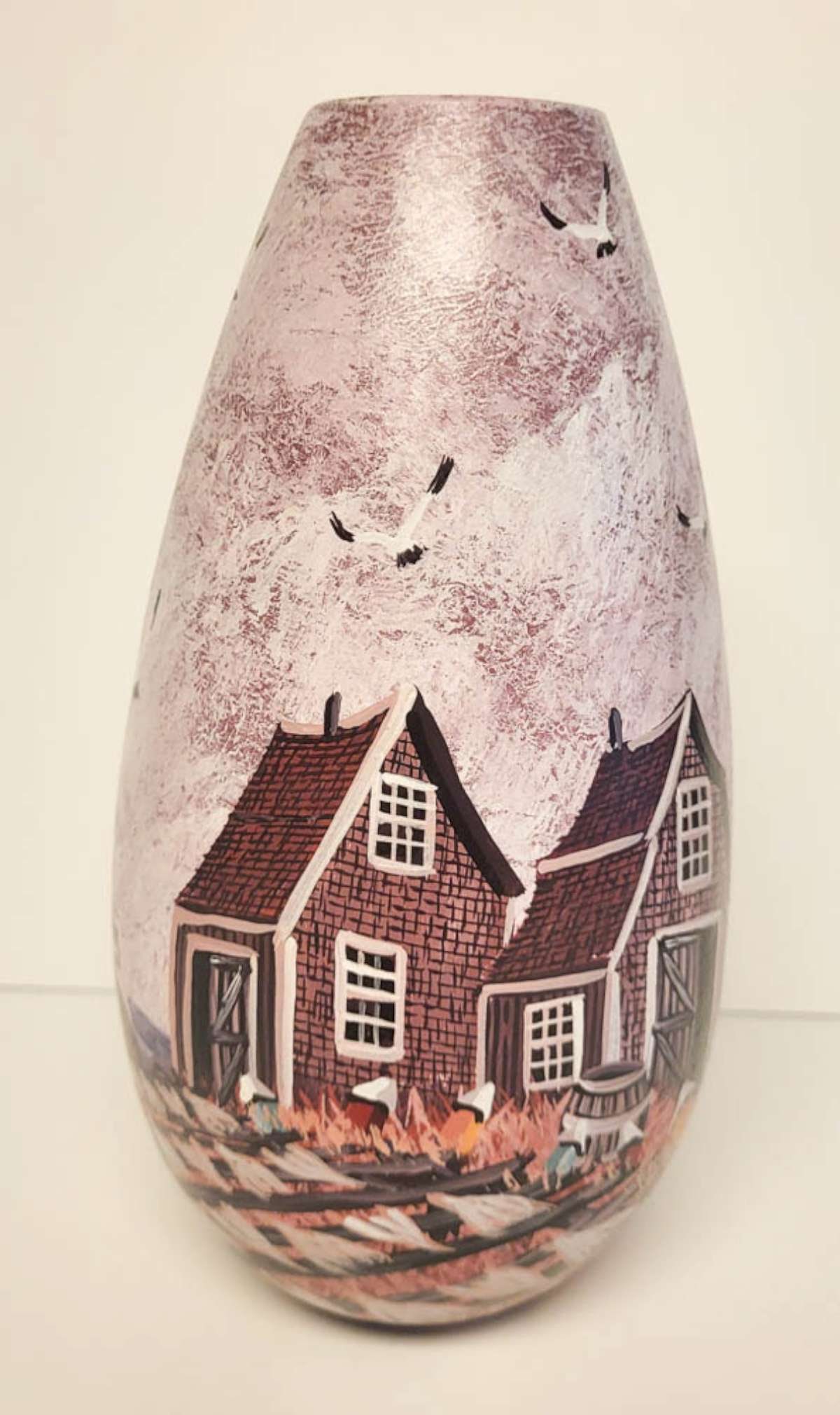 vintage Canadian artist vase: vintage vase by Ronald A. Gonzague Landry (1955-1997), hand painted and signed by the artist, depicting a street scene with houses and seagulls in the air, with the original paperwor