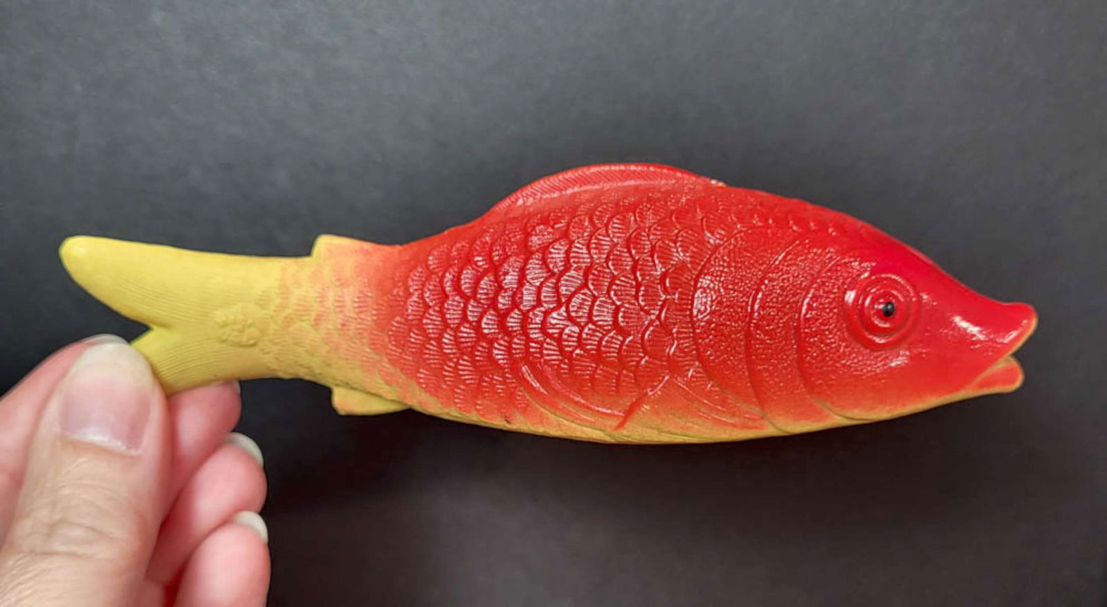 antique animal shaped celluloid rattle toy: vintage or antique red and yellow fish shaped celluloid baby rattle toy, maker's mark as shown USA
