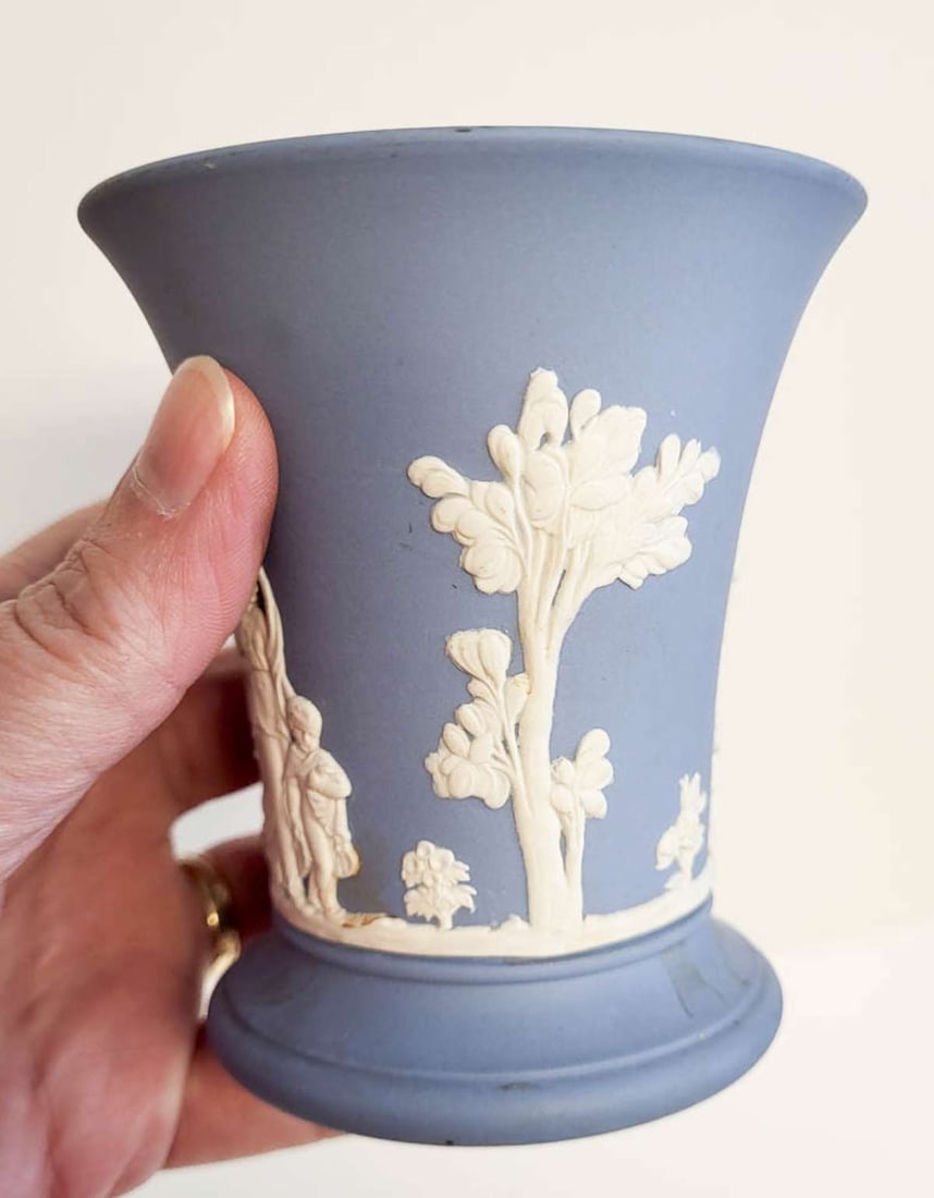 antique English Wedgwood porcelain vase: vintage or antique made in England Jasperware posy or trumpet vase with blue background and white applied classical figural scenes on the bottom rim