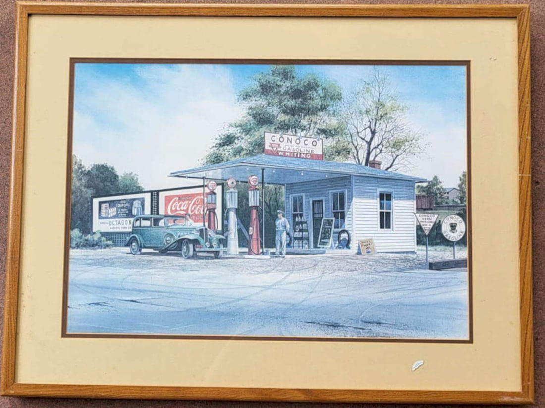 large vintage automobile related print in frame: beautifully framed and matted large poster print depicting a vintage or antique car (gasoline dispensers are the old style!) waiting at a Conoco gas station to fill up on gasoline or petroleum,