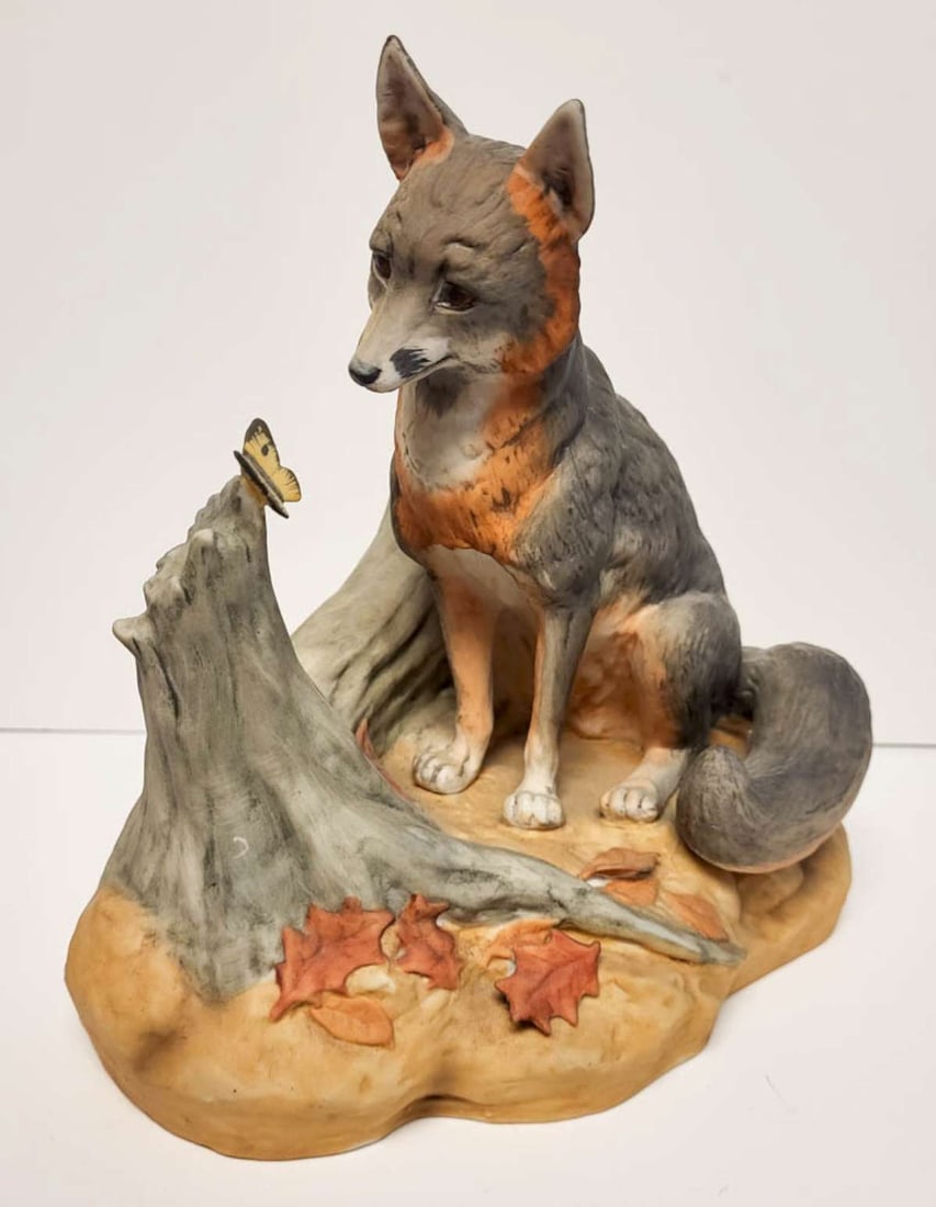 vintage figural animal liquor bottle: 1983 Ski Country limited edition decanter by Foss Company of Golden Colorado and made of bisque or porcelain and shaped like a gray fox admiring a butterfly sitting on a tree stump