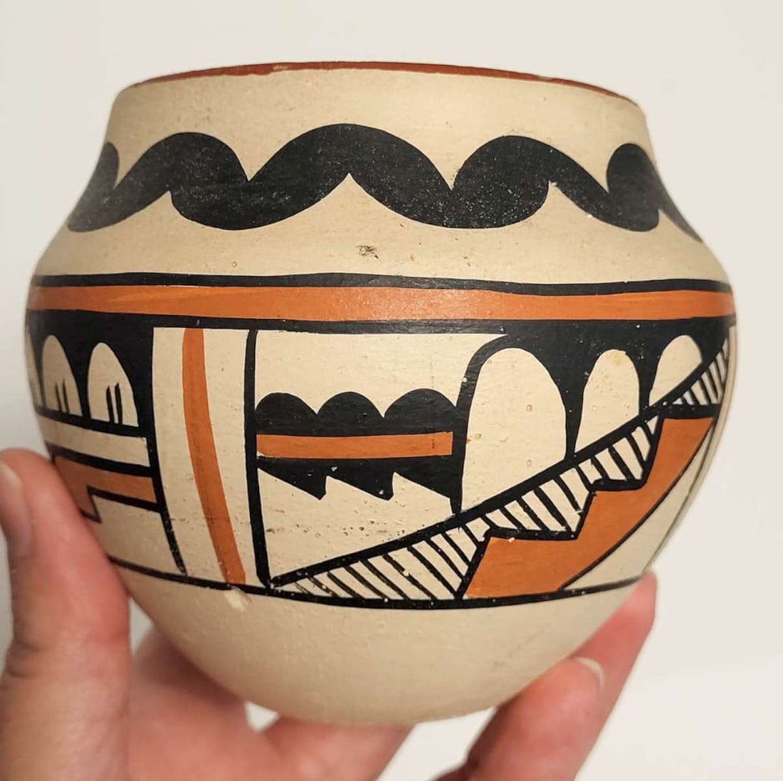 vintage Pueblo pottery vessel: vintage or antique Southwest Native American Indian clay pot or jar with brown, black and cream hand painted geometric design, marked on bottom as shown A. Tafoya, Jemez NM New