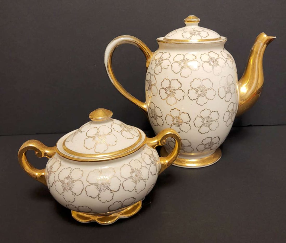 vintage gilt Kingswood partial teaset: vintage cream with gilt floral or flower accent design partial tea set: double handled and lidded sugar bowl and tea pot