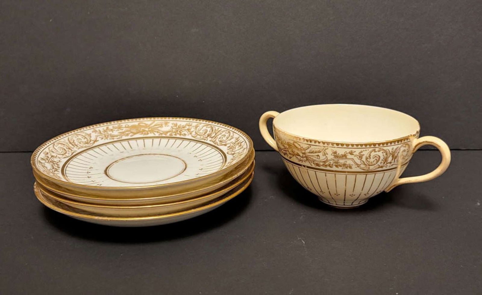 antique English Royal porcelain set: Royal Cauldon Brown Westhead and Moore marked lot or set of 4 matching saucers and 1 double handled cup (for bouillon?)