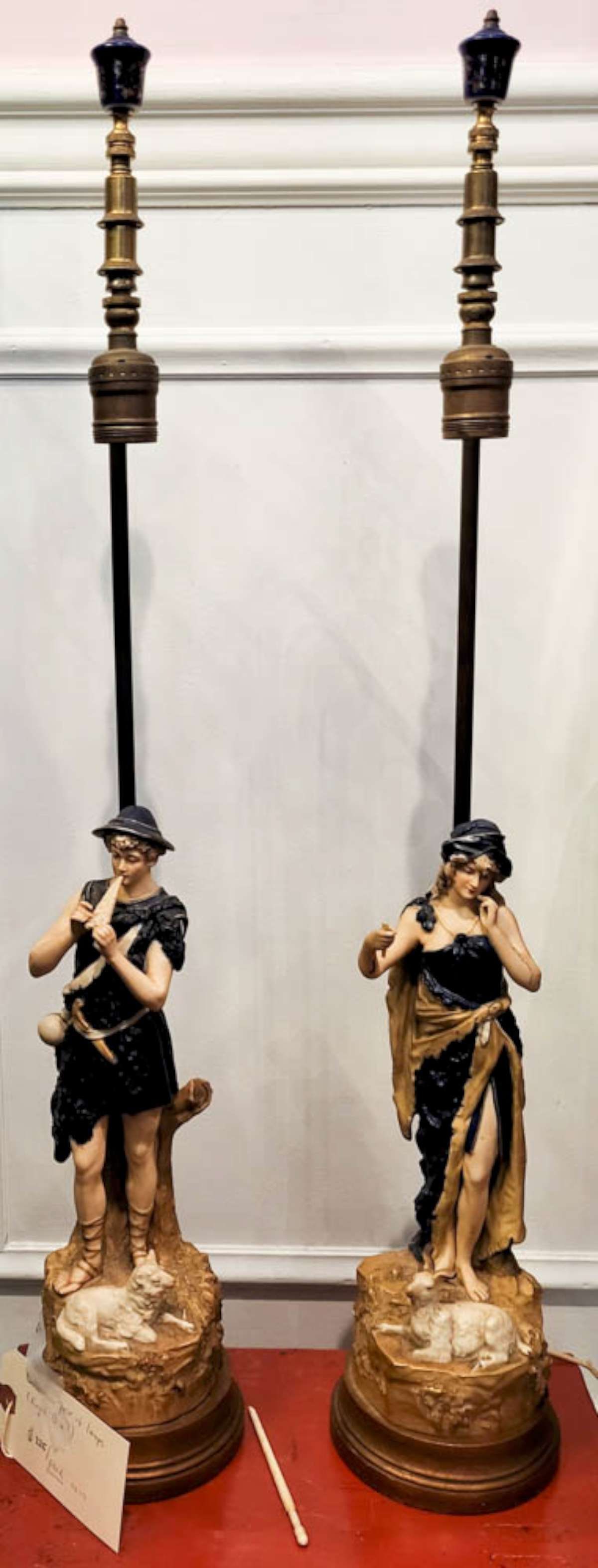 PAIR antique Royal Dux table lamps with animals: matching PAIR of antique porcelain figural statues made into electrified lamps and set on a brass base with felt underneath, so cannot see the maker's mark (they certainly look Czech and ve