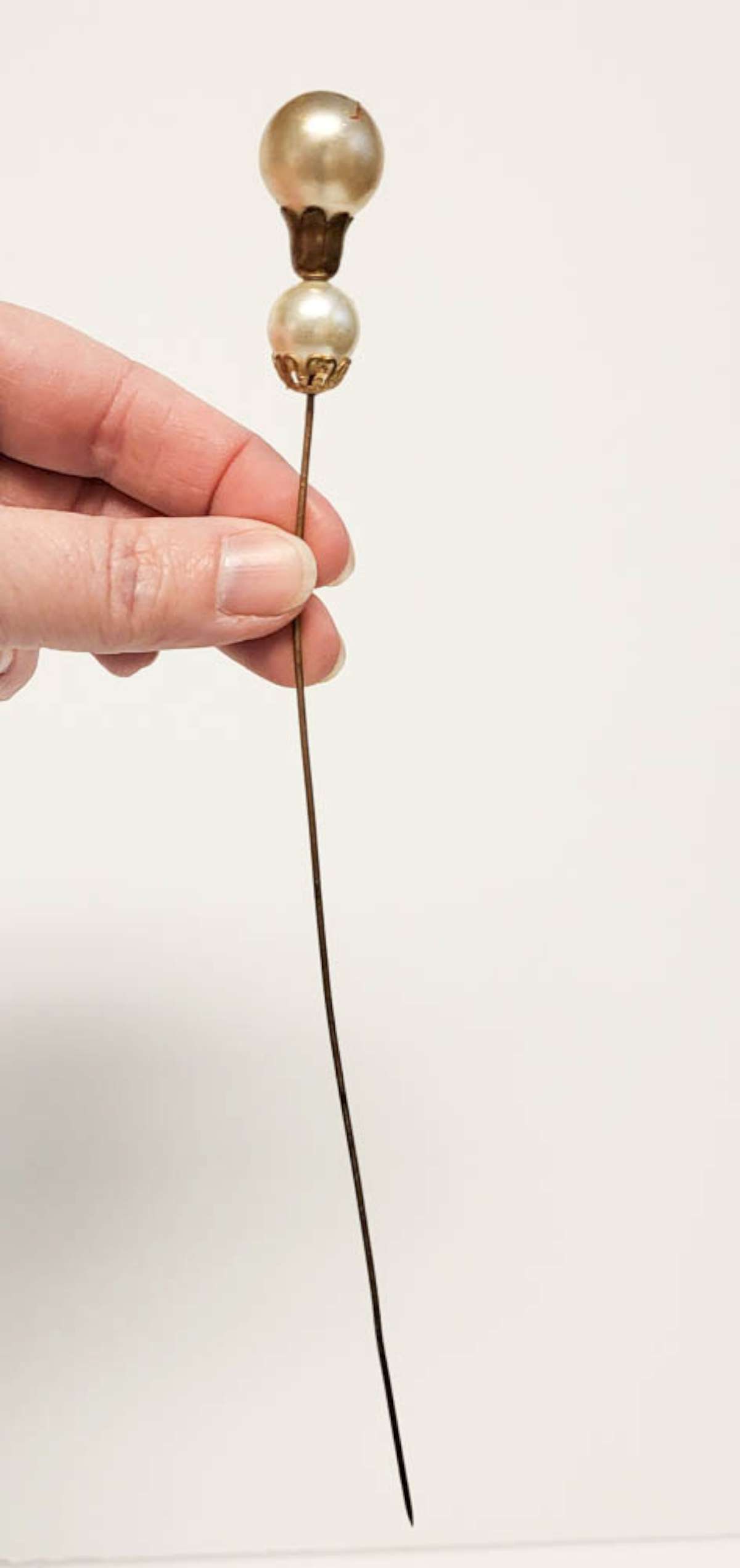 vintage hat pin faux pearls: vintage or antique long hat pin with metal post and caps and 2 faux pearls