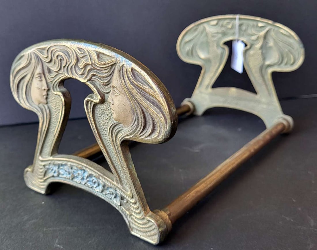 Art Nouveau book holder: adjustable and extendable antique bronze Victorian library piece with both ends being double maiden or ladies' heads with flowing hair, numbered as shown