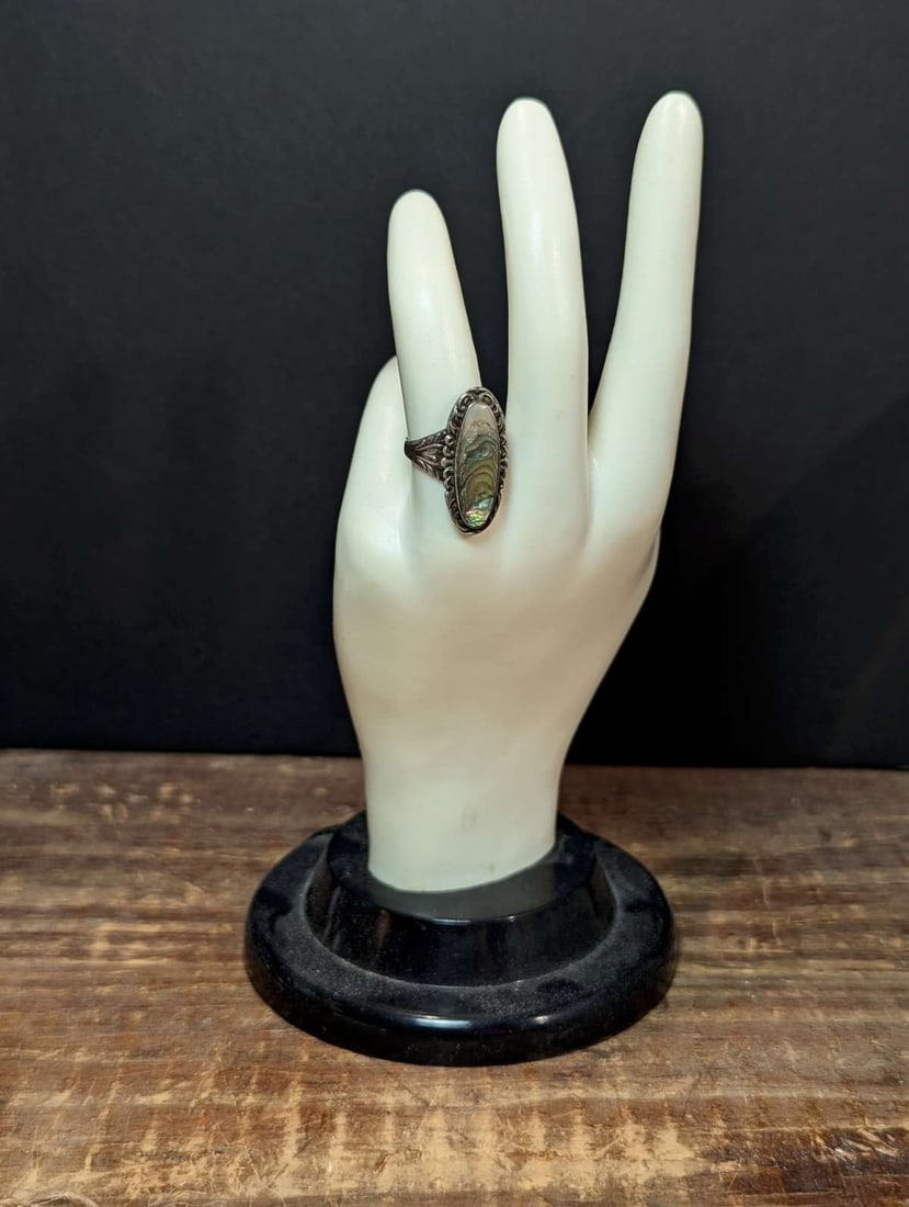 antique estate jewelry: Abalone silver ring: vintage or antique marked Sterling silver ring with embossed band with abstract feather or leaf design and large oval center Abalone shell, possibly Native American Indian but not sureabout a ri