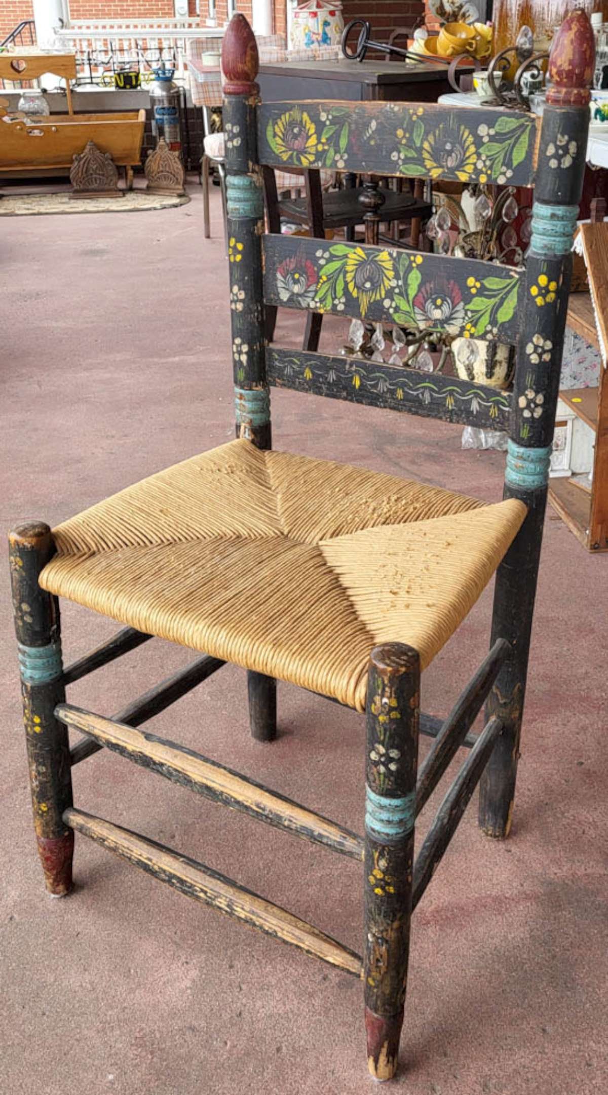 antique Primitive painted rush seat chair: antique side or occasional chair in Primitive style with very old hand painted floral or flower designs and rush woven seat