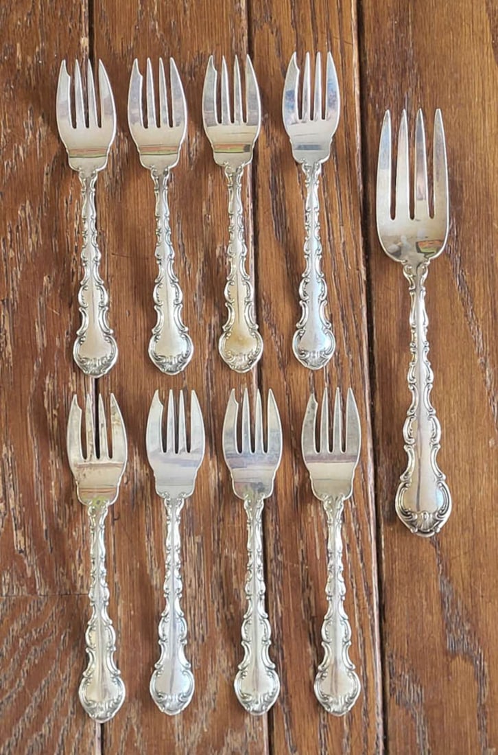 Sterling silver Gorham flatware - forks: antique set of 8 marked Sterling Gorham serving forks with 1 larger (likely serving) fork with elaborate handlestotal weight 408 gramsInfo from online search: "Flowing scrollwork follows the gent