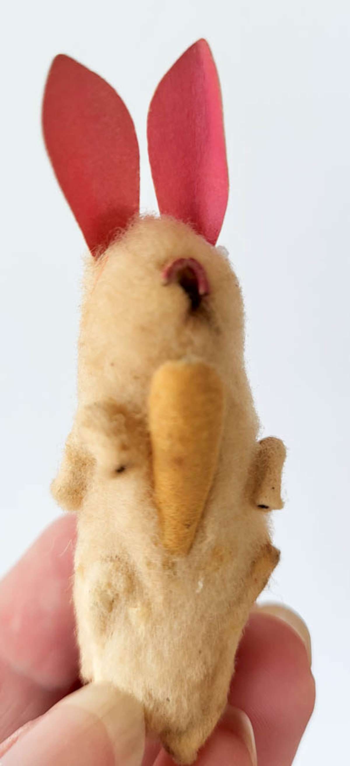 vintage Easter display piece: vintage ca. 1940's Easter Holiday felted wool bunny rabbit with pink ears and orange carrot, made with wire too and marked Made in Japan as shown
