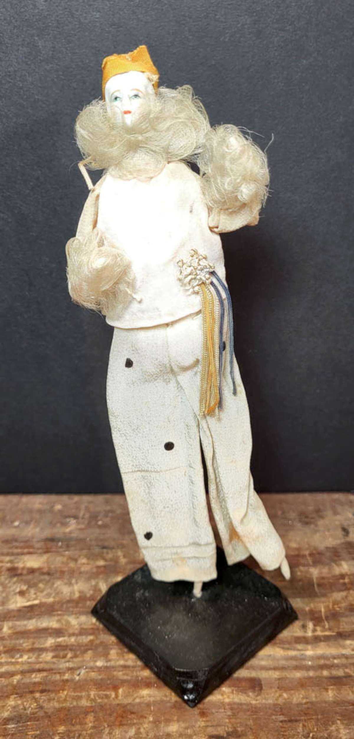 antique French pierot doll: antique late 1800's to early 1900's French boudoir doll on a stand, bisque head with fabric and wooden stick body