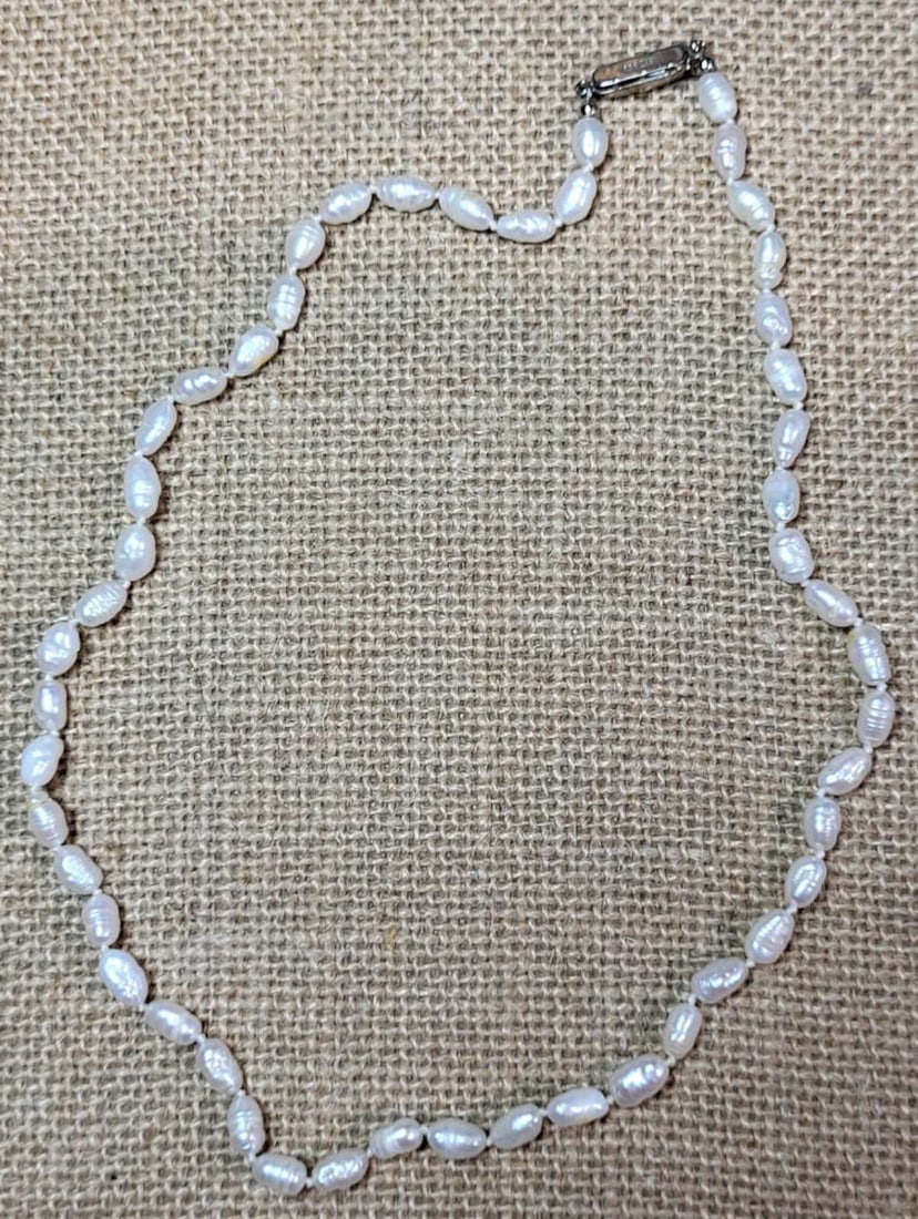 antique estate jewelry: pearl necklace: vintage or likely even antique freshwater pearl necklace with mark for 835 European silver and maker's mark as shown on the clasp, clap with clear cut rhinestone (or tiny chip diamond?) M