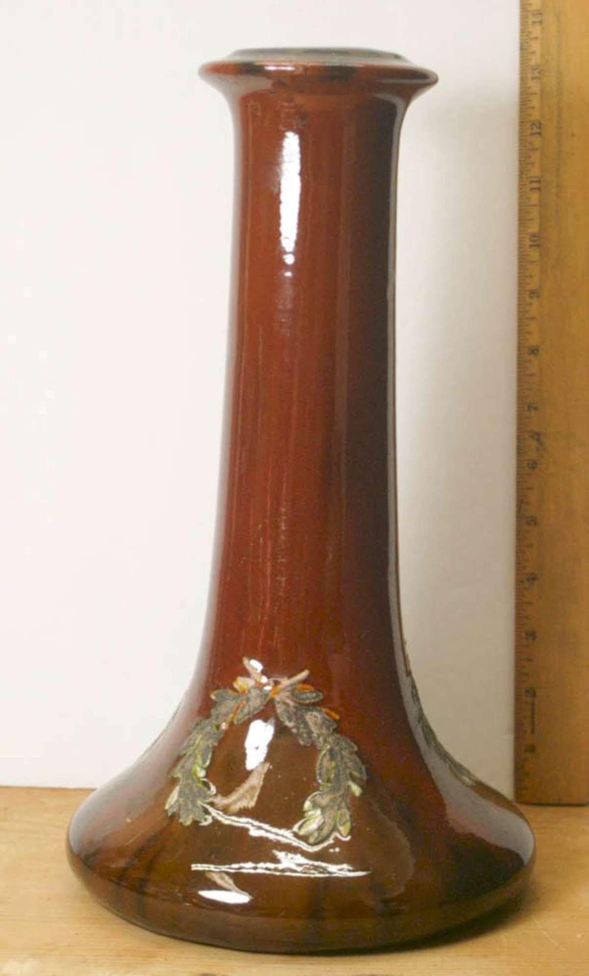 vintage Peters and Reed pottery vase: unmarked, but most likely a Peters and Reed vase, Sprigware Wreath design with a glossy brown glaze and leaf wreath (non-glazed)