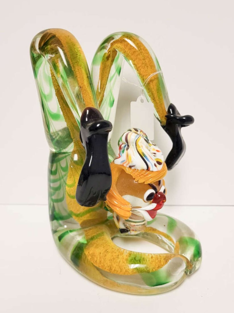 vintage Murano glass clown sculpture: reported by owner to have been purchased in Italy, this is an unmarked but very likely a Murano tall acrobatic glass figural statue, shaped like a clown with a colorful striped outfit on