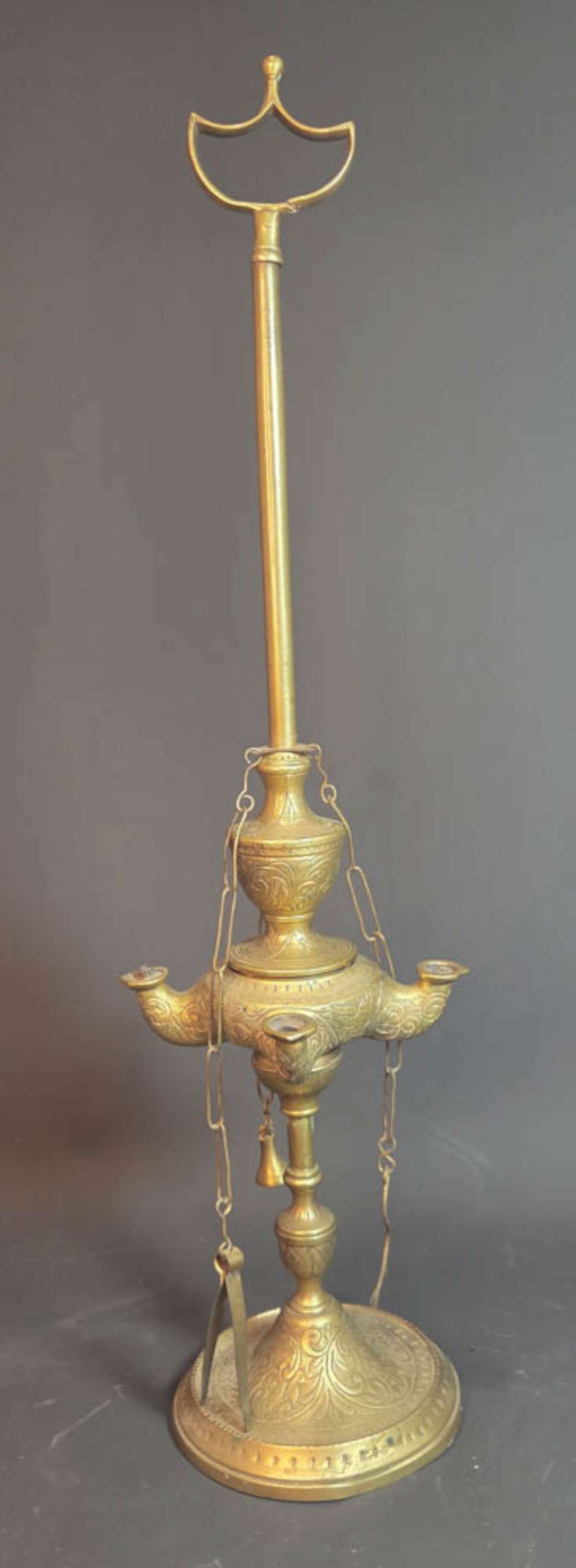vintage brass table lamp: not sure if this is an incense or an oil lamp, tall model with handle for easy carrying around, possibly Middle Eastern or Indian (?) and with beautiful engraved swirl design