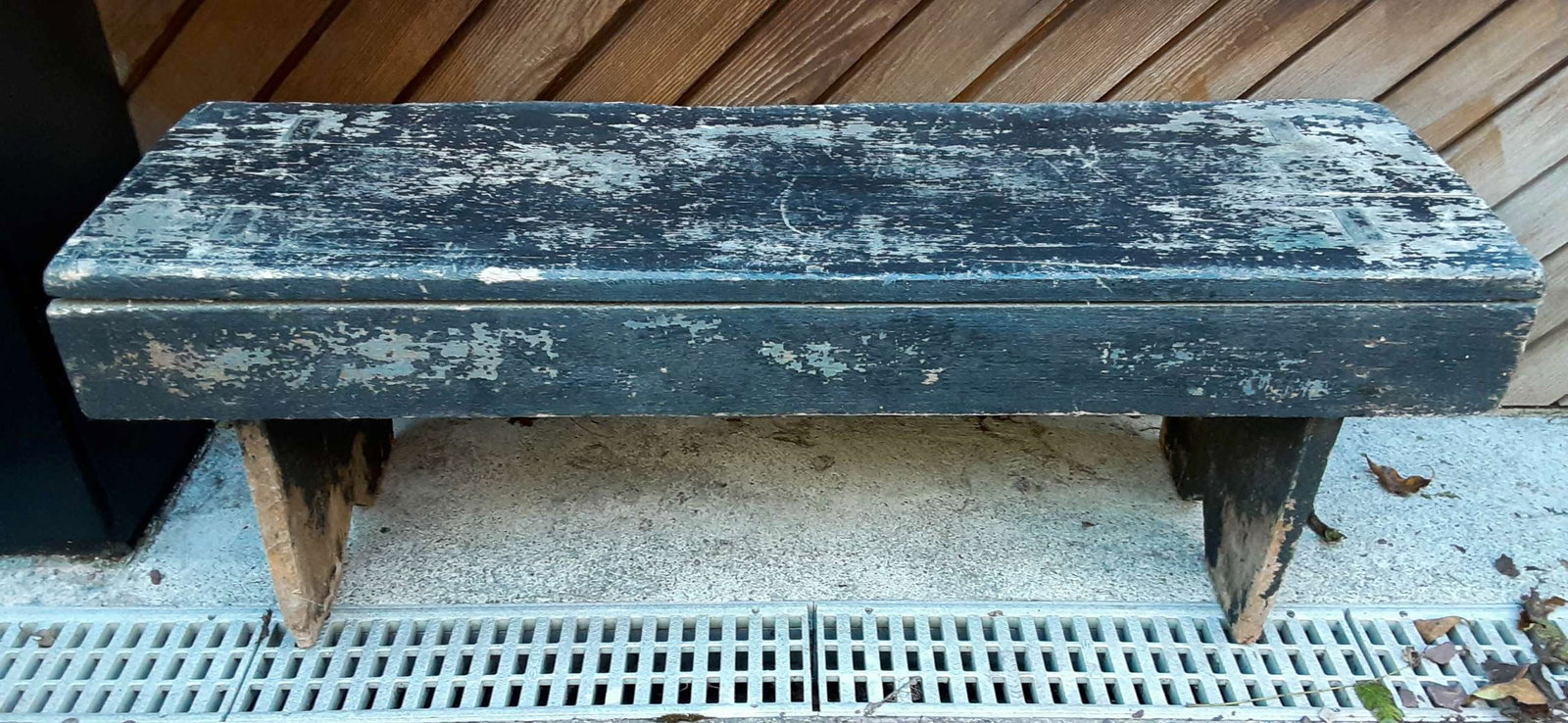 antique black Primitive bench: antique Primitive or Early American long and narrow bench with black paint, nice mortise and tenon construction and with boot jack feet, one side has a skirt 42 1/4" long by 13" 