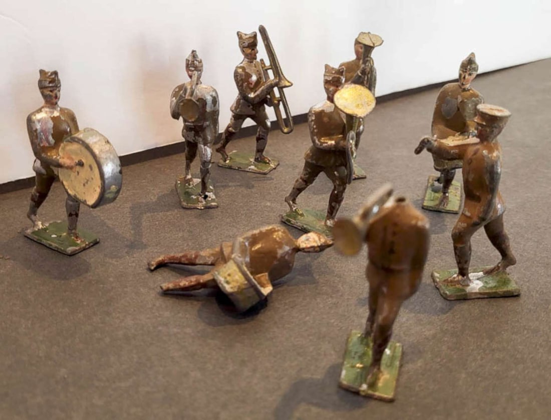 antique toy soldiers in wooden box: set or lot of 9 antique zinc or lead toy figures in a wooden box, appears to be an assembled set (different makers perhaps) of an Army or other military branch band with drums,