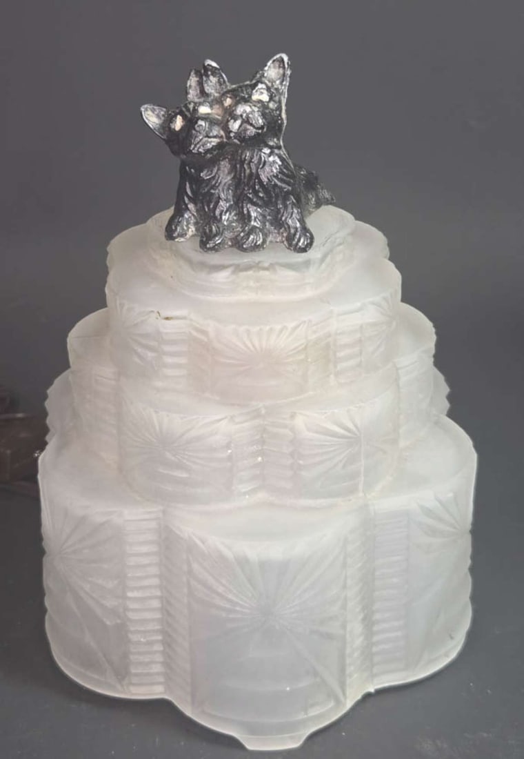 antique Art Deco period table lamp with dog: vintage or antique Art Deco frosted wedding cake stepped glass boudoir lamp or nightlight with black Spelter or white pot metal pair of cuddling Scottish Terrier or Scottie figurines or figural dog st