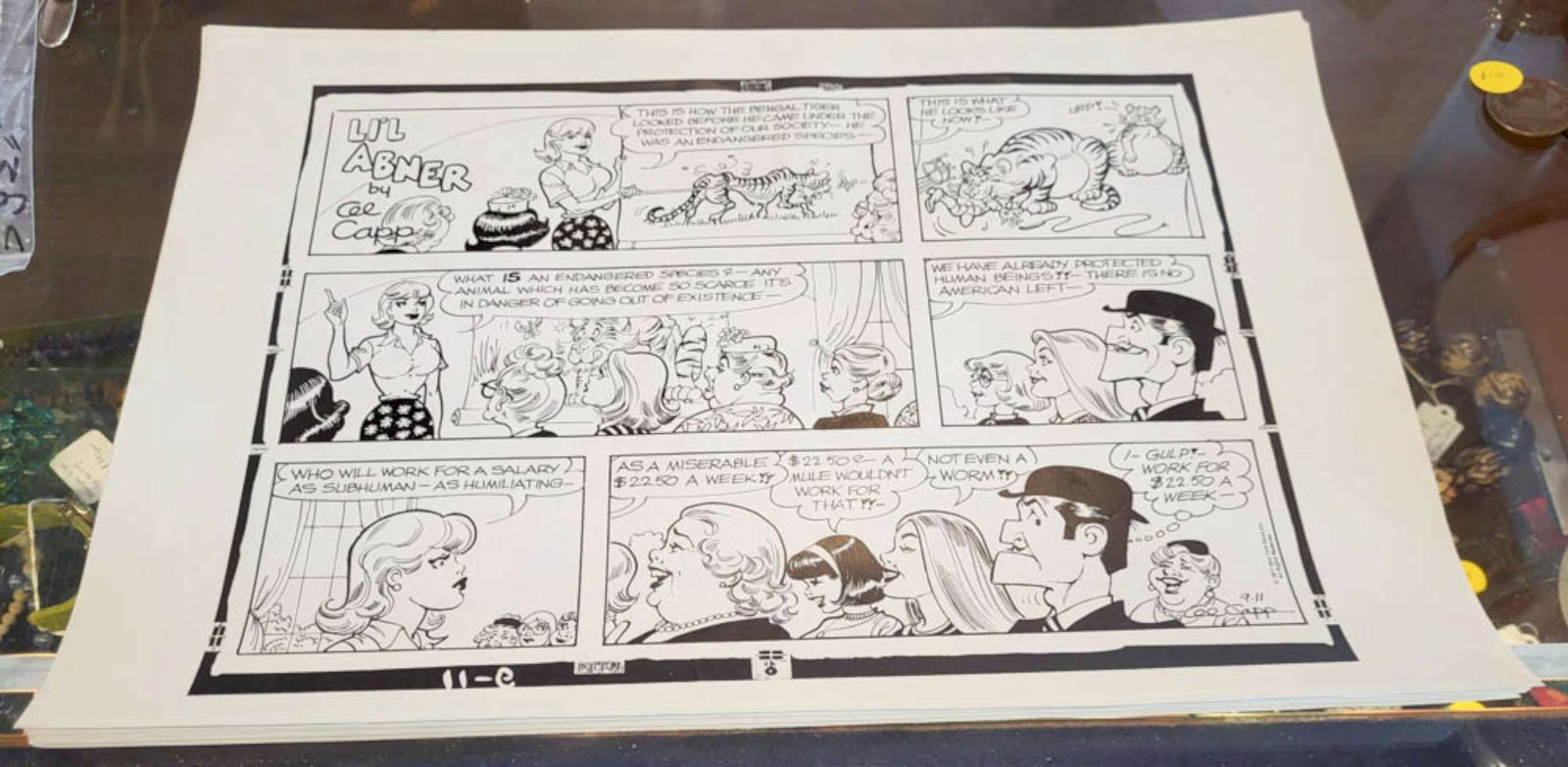 1977 Lil' Abner comic strip proof: large sheet newspaper comic strip proof from 1977 for Lil' Abner by Al Capp about what person would still work for only 22.50 dollars per week, New York News Inc All Rights Reserved paper a
