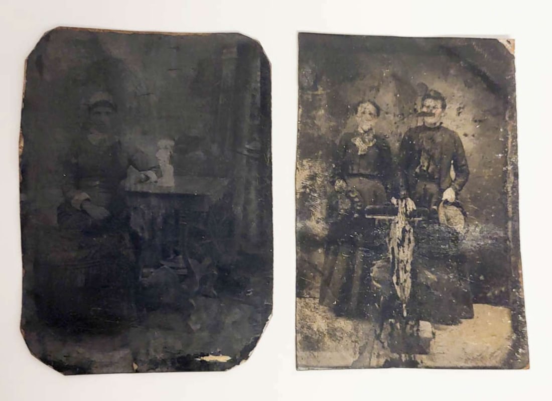 pair antique tintype photographs: set or lot of two ca. 1890's tintype photographs, one a black and white portrait photograph of a (presumably) husband and wife standing behind a parlor chair and holding their hats,