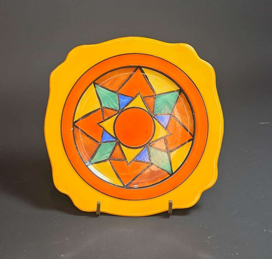 vintage Clarice Cliff Bizarre plate: vibrantly colored geometric star or double V (?) design hand painted pate by Burslem England pottery plate, by Clarice Cliff Bizarre line about 6 1/4" squared