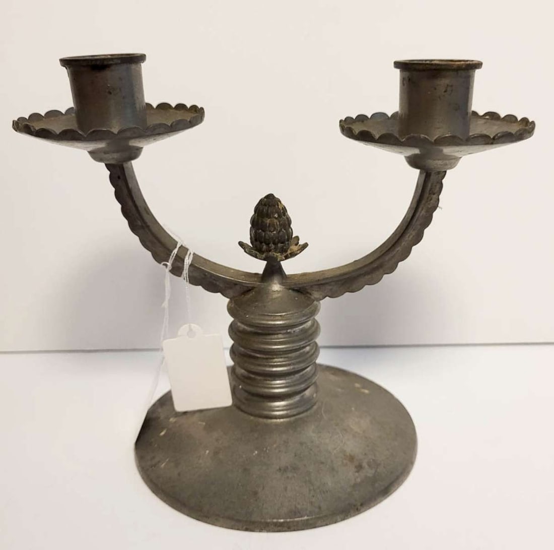 antique Reed and Barton pewter candle holder: 1928 Reed and Barton double headed candlestick, acorn or pineapple shaped finial in the center and marked as shown underneath and numbered 106 A pair of these is on view in the Brooklyn Museum!
