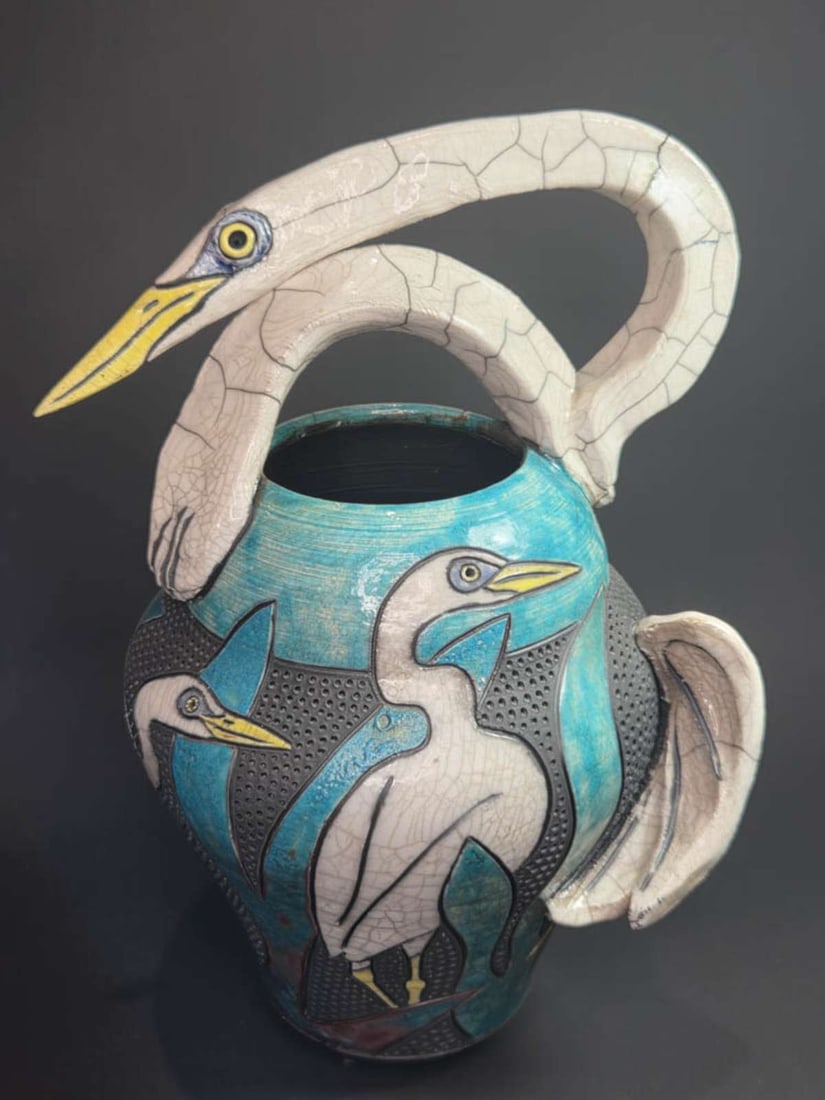 vintage designer Raku pottery bird vase: unusually shaped tall Raku pottery vase, signed underneath as shown by listed artist Robin Duke Rogers, dated 1997, bulbous shaped textured and brightly colored body of the vase with
