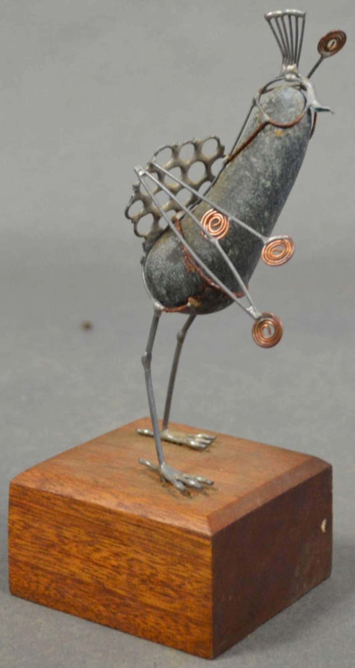 unusual vintage artist made bird sculpture: small but intricately made Steampunk bird who's body is a stone or piece of rock and the rest are coiled copper and metal wire pieces, mounted on a block of wood, has a great MCM or M