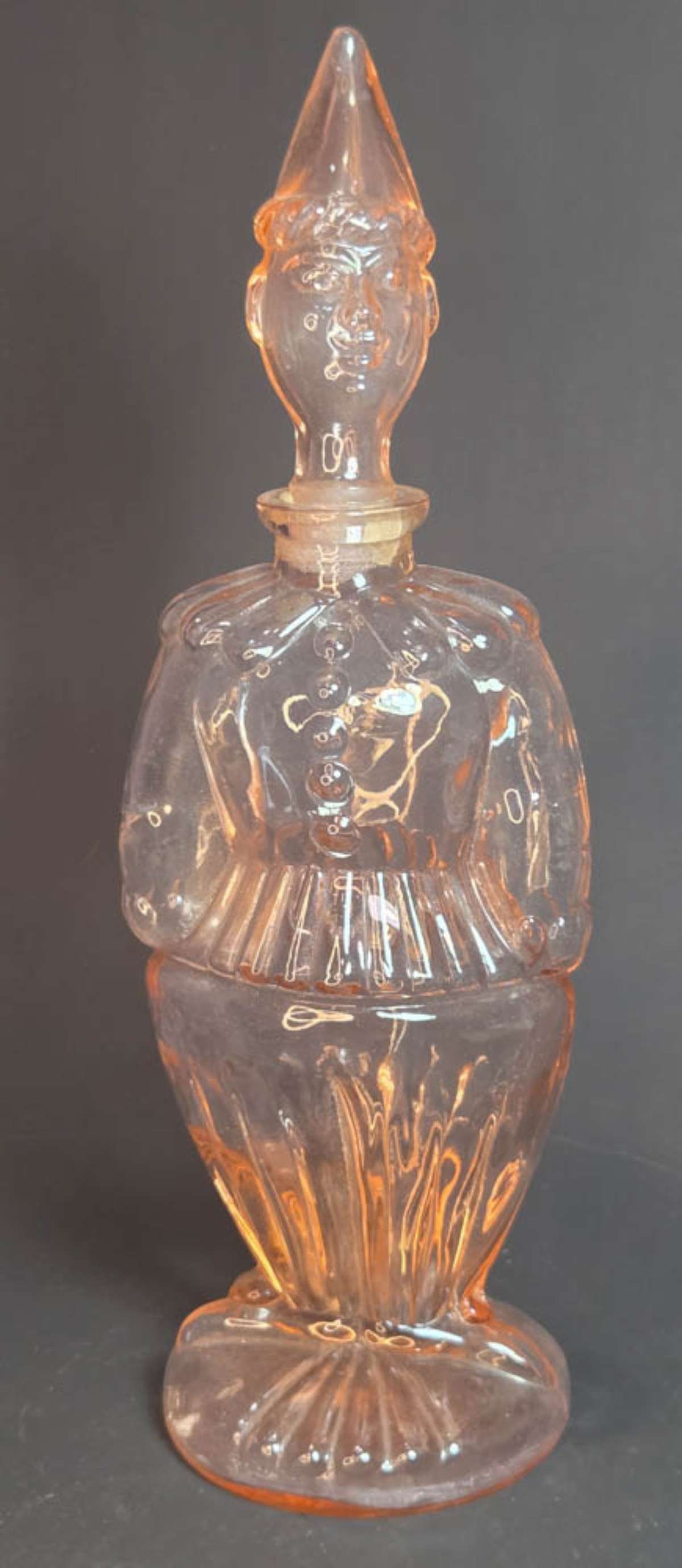 vintage MCM pink glass harlequin bottle: vintage Mid Century Modern pink glass bottle with an Elf or Clown shape and the stopper is the head, marked Made in France but I've seen these bottles online and they were listed as being f
