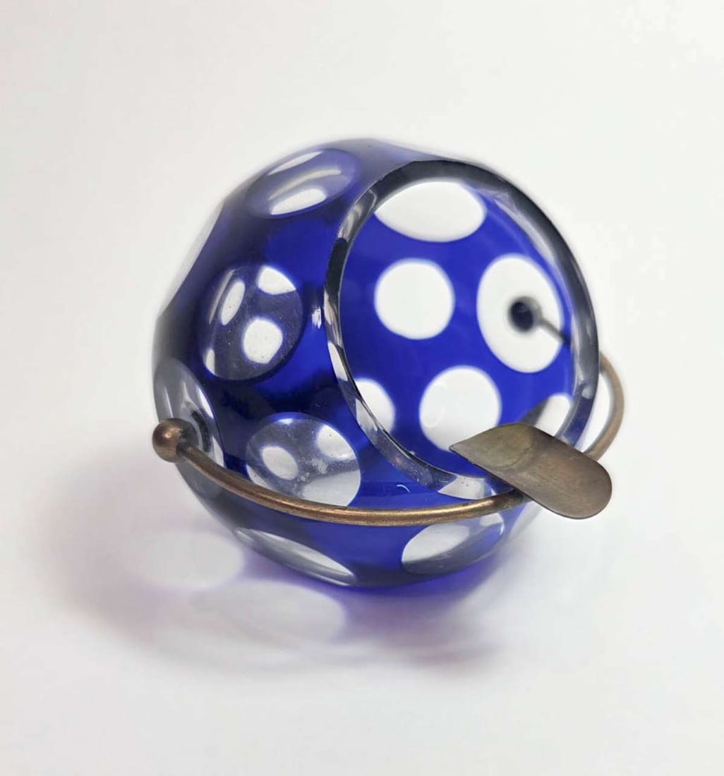 Atomic Age cut glass designer ashtray: East German Space Age 1970's late MCM or Mid Century Modern ball shaped cut Cobalt blue to clear ashtray with brass movable or posable cigarette holder and designed by Marita Voigt for Harzkrista