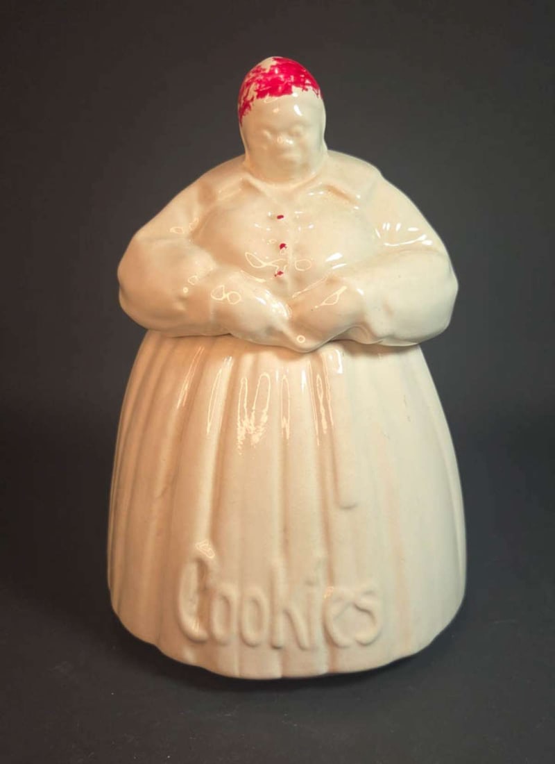 antique pottery Mammy cookie jar: antique McCoy pottery Aunt Jemima cookie pot with lid and red painted accents, marked as shown underneath