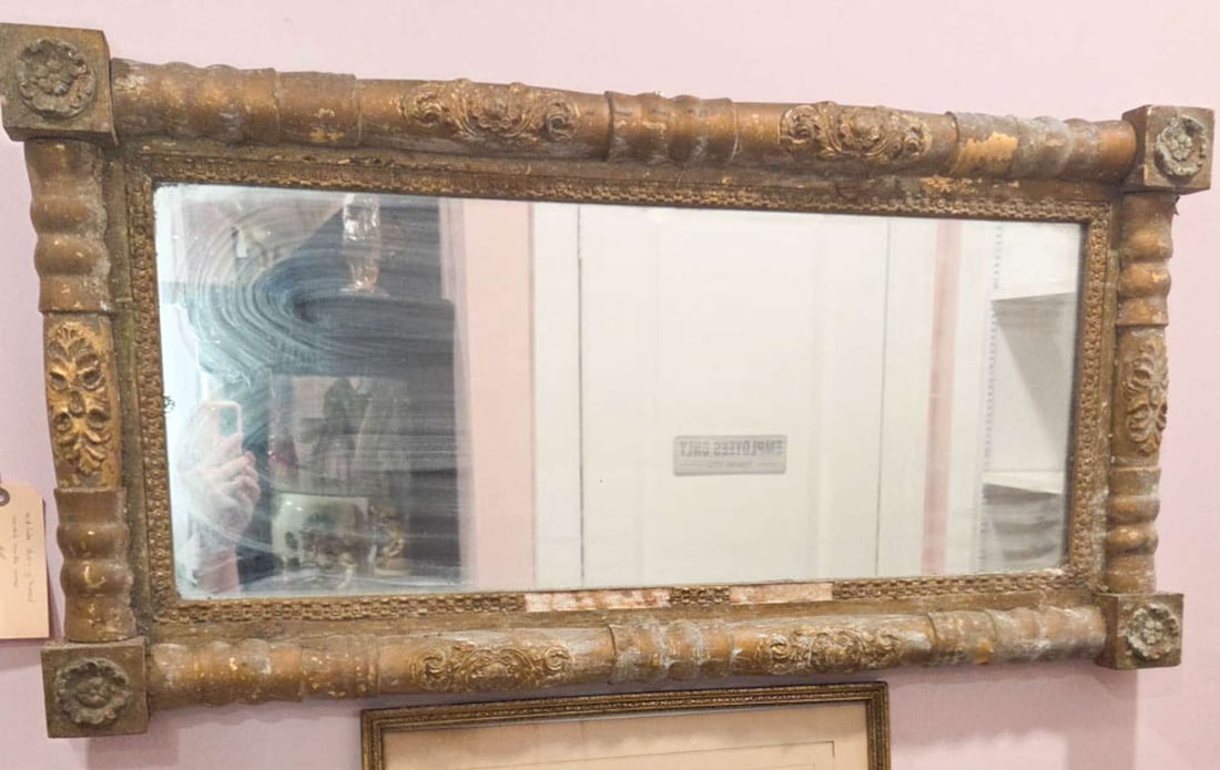 antique gilt wooden mantle mirror: antique over the mantle wall hung mirror with heavy carved and gilt wooden frame, Sheraton or American Empire style, likely 1850's or so wooden frame is 20" high by 39 1/8" 