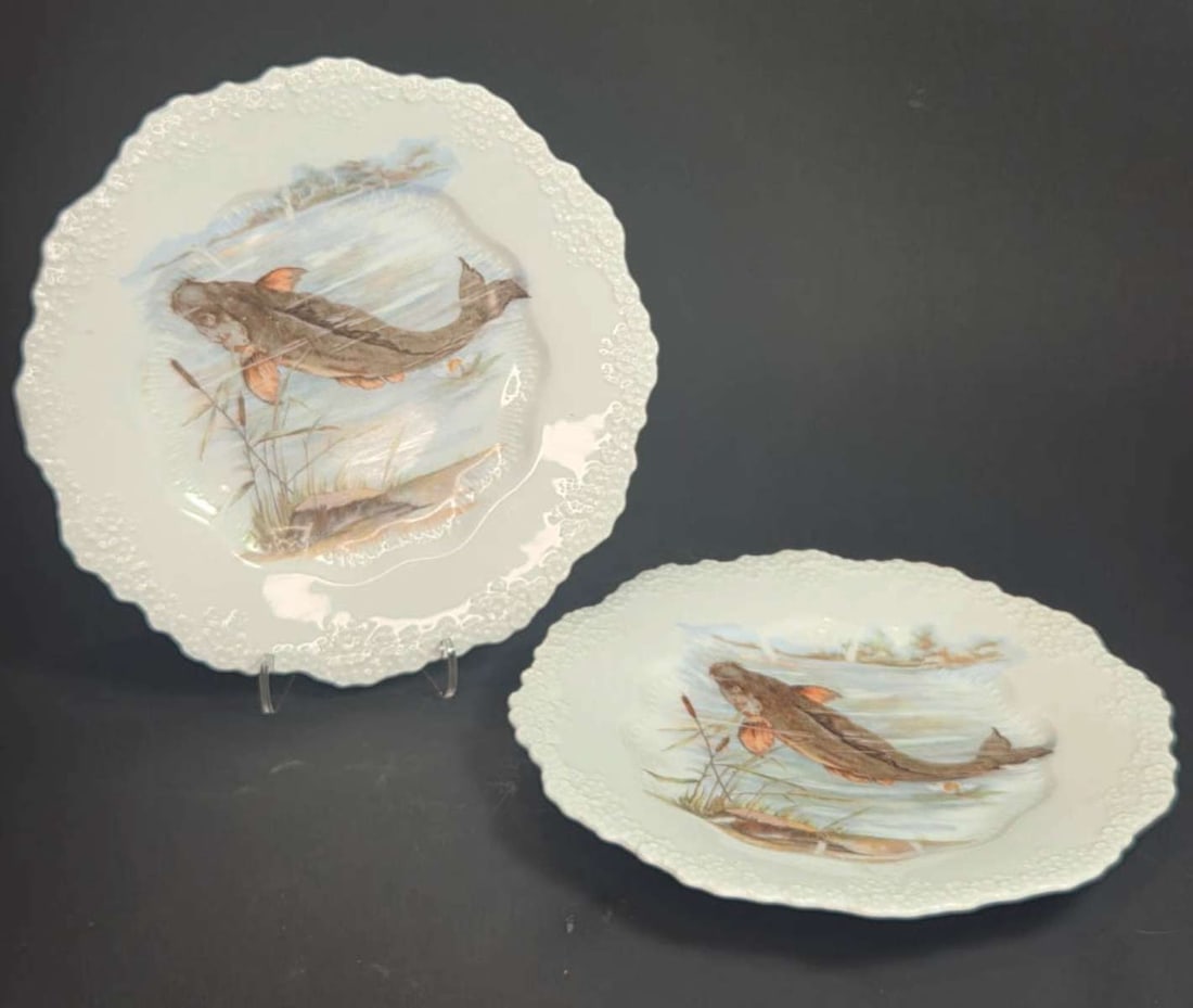 PAIR antique German porcelain fish plates: pair or set of two scalloped edge porcelain plates with fish swimming under water and with Cattails in the foreground, marked as shown Info from online search: "Hermann Ohme porcelain plate