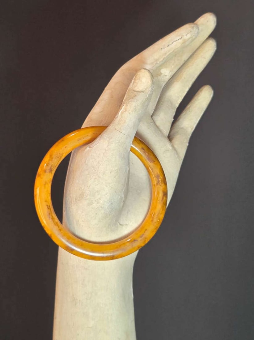 vintage estate jewelry: Bakelite bracelet: vintage or antique chunky and rounded Butterscotch yellow with brown marbled design bangle bracelet, Art Deco period