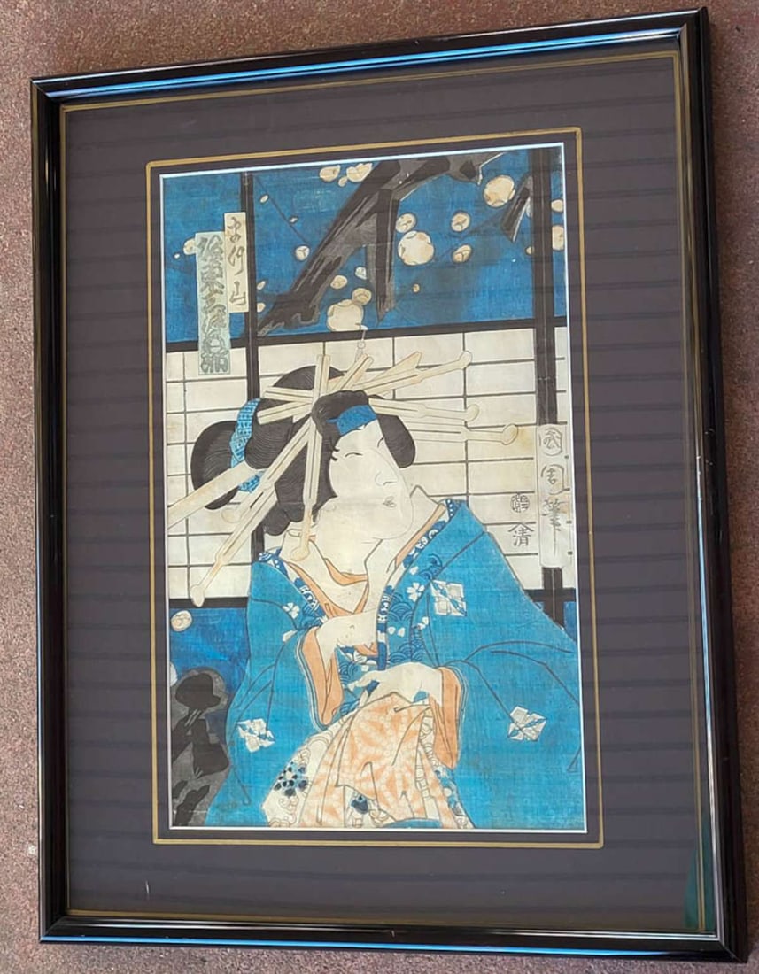 antique artist signed Japanese woodblock: antique 1800's framed Japanese woodblock print with a vibrantly blue and orange colored scene depicting a Beauty or Geisha in a gorgeous kimono and rice paper screen in the background, in a