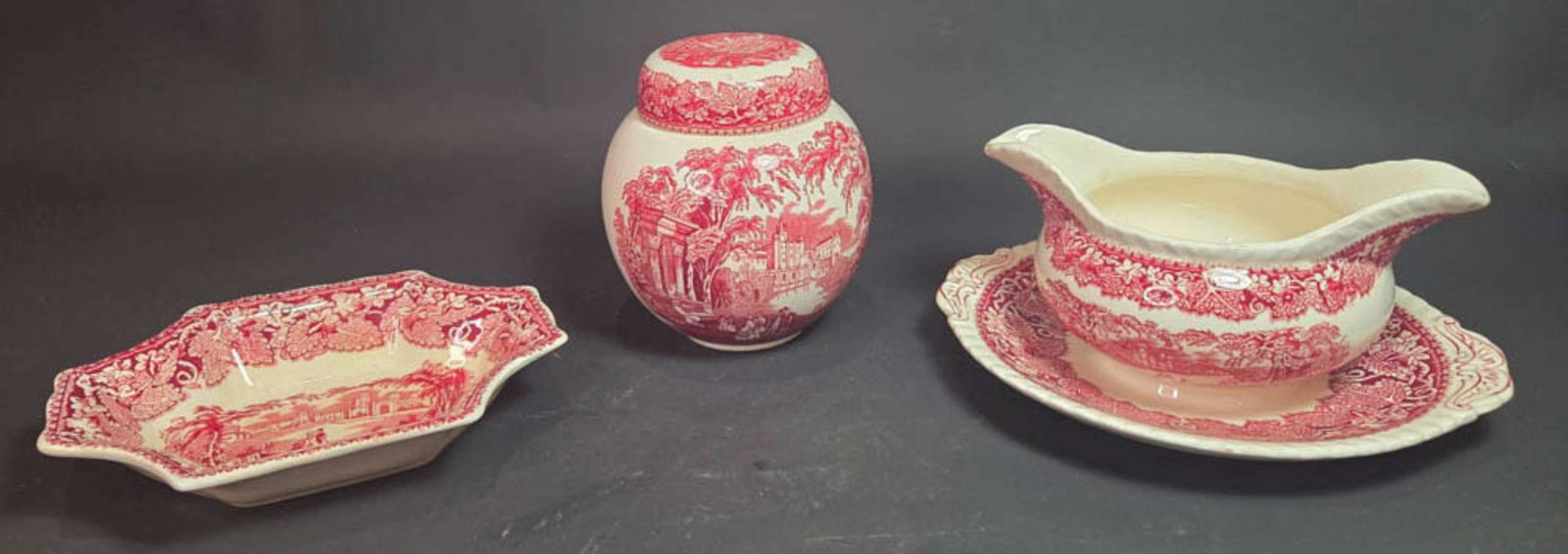 three English ironstone transferware pieces: set or lot of two beautiful vintage or antique ironstone china pieces, including a gravy sauce boat with attached underplate, a (sweetmeat?) dish and a lidded ginger or prunus jar or pot&c