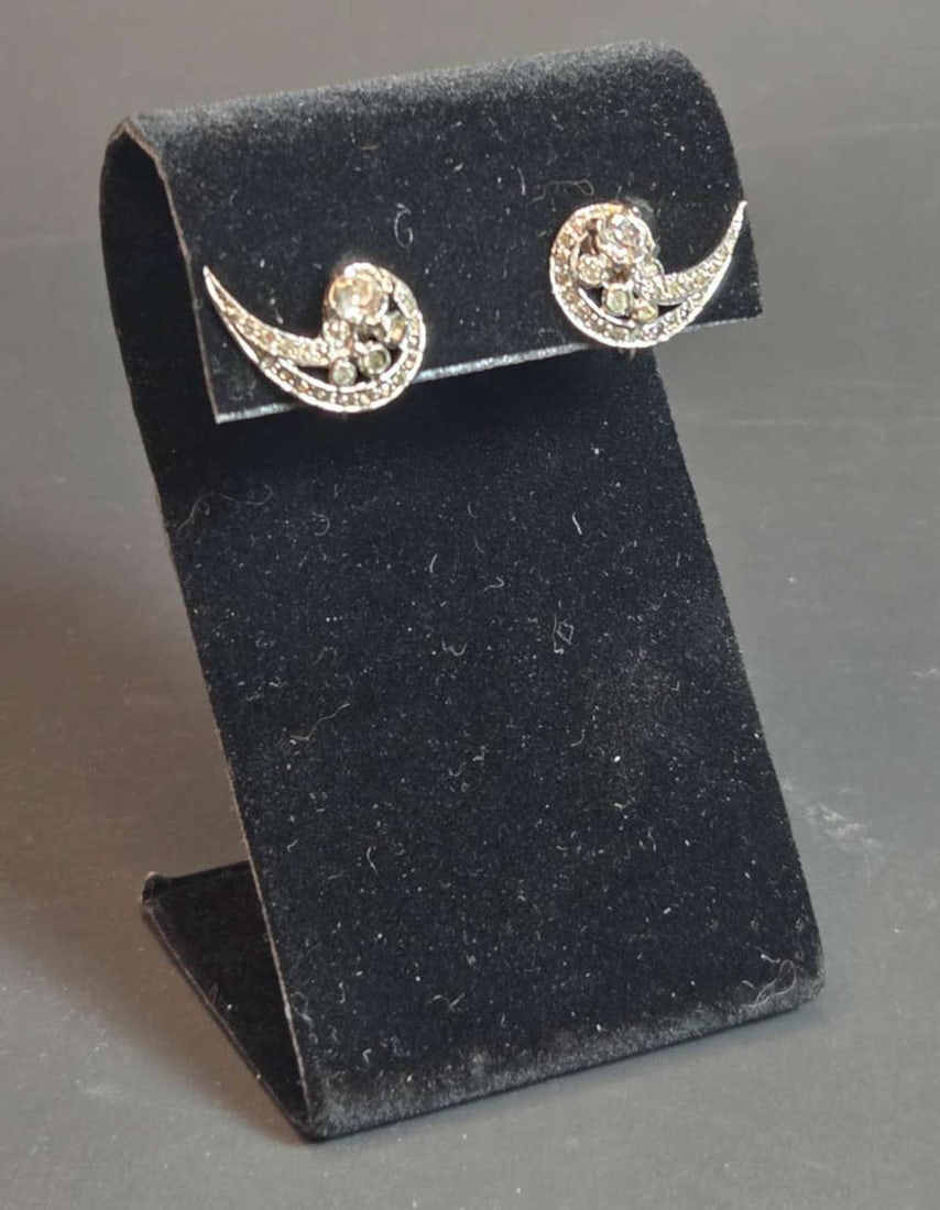 vintage estate jewelry: swirl earrings: vintage or antique screw back pair of earrings in a swoop or swirl shape with clear cut rhinestones, paste or diamante, appears unsigned but in the style of Krementz or other MCM or Mid Ce