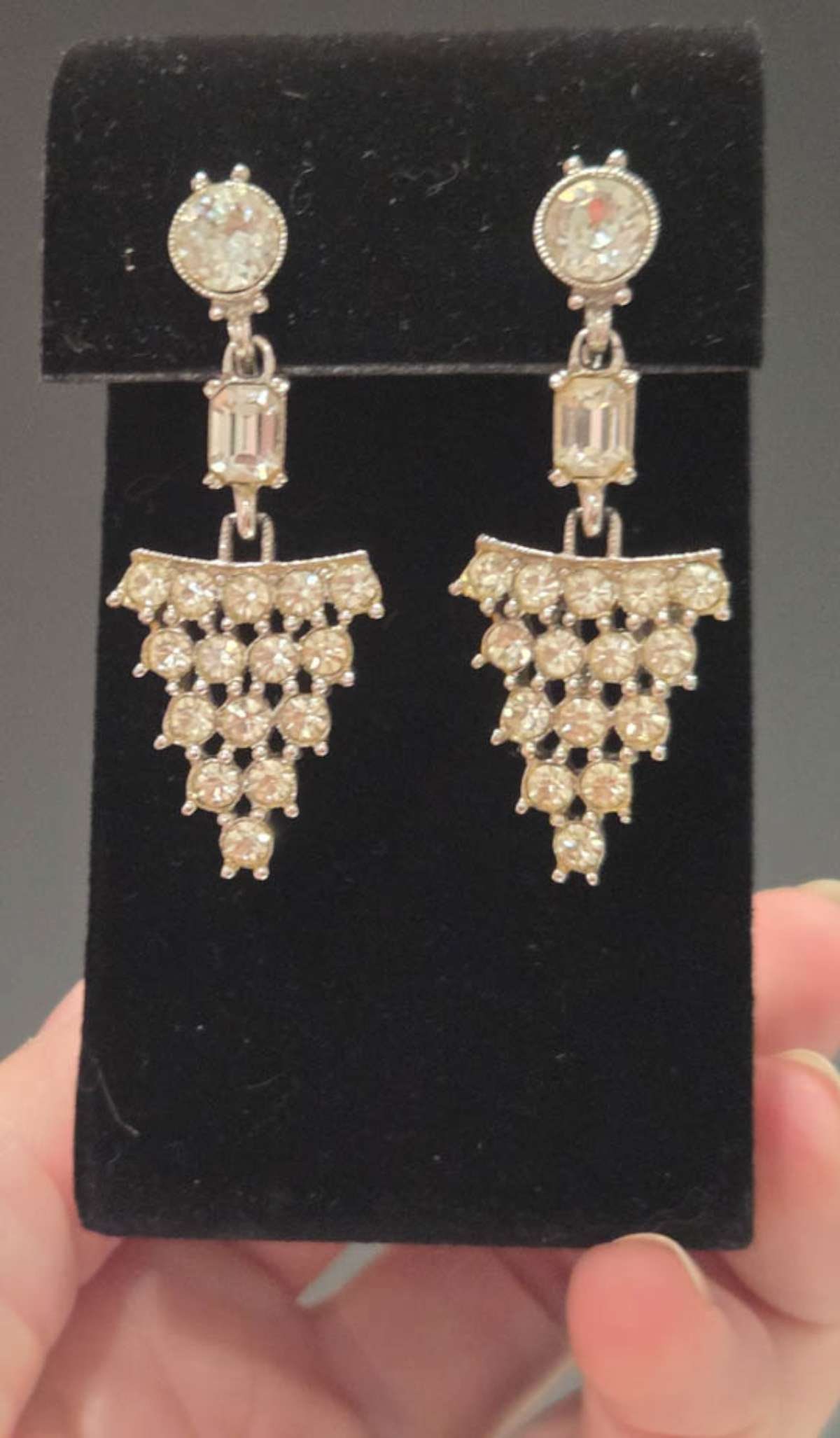 vintage estate jewelry: rhinestone earrings: vintage or antique screw back pair of earrings, unmarked and with dangly triangular drop, with clear cut rhinestones, paste or diamante