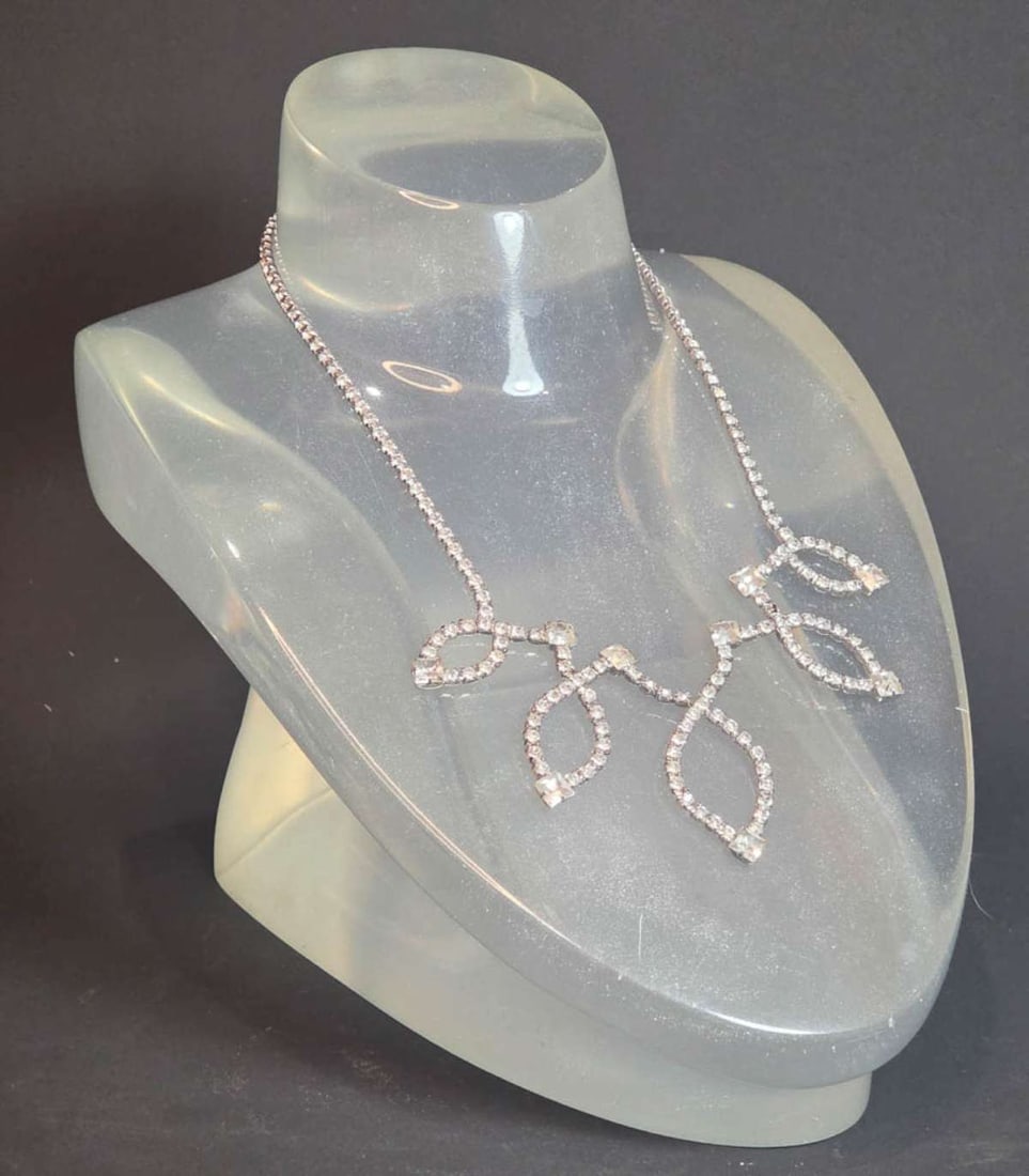 vintage estate jewelry: rhinestone necklace: vintage or antique necklace with bib style abstract leaf design and clear cut rhinestone, paste or diamante stones adjustable length, longest about 18 1/2"