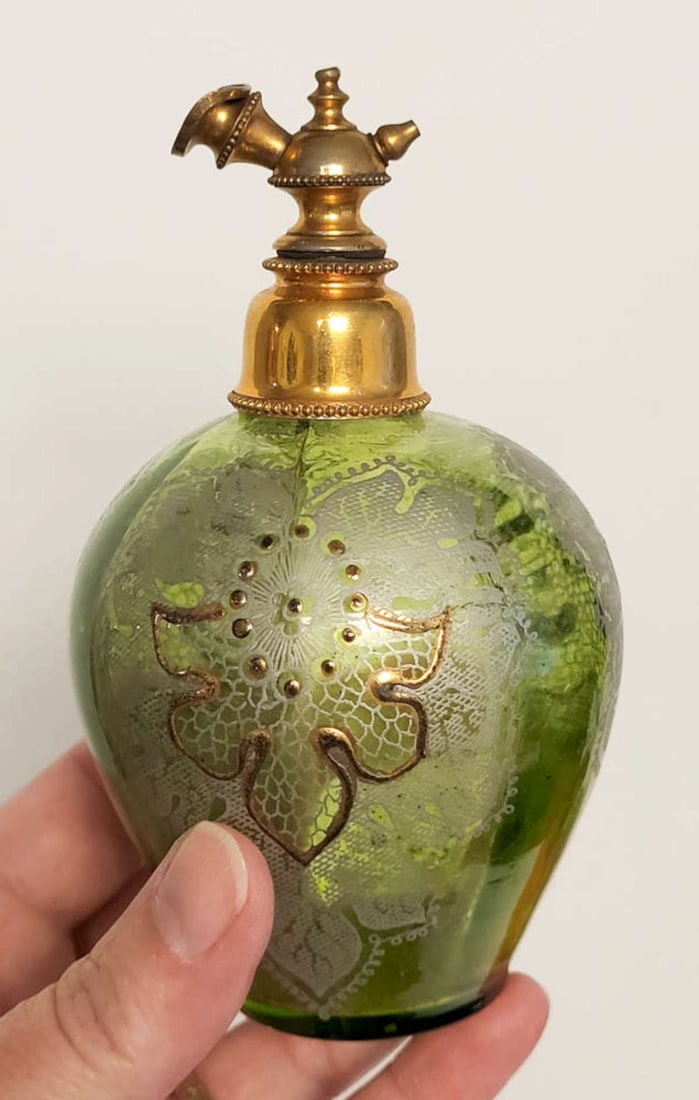 antique Victorian glass atomizer bottle: antique Edwardian or Victorian Era perfume bottle, green glass with white and gilt hand painted enamelwork and brass atomizer workings, unmarked but similar to Moser glass pieces