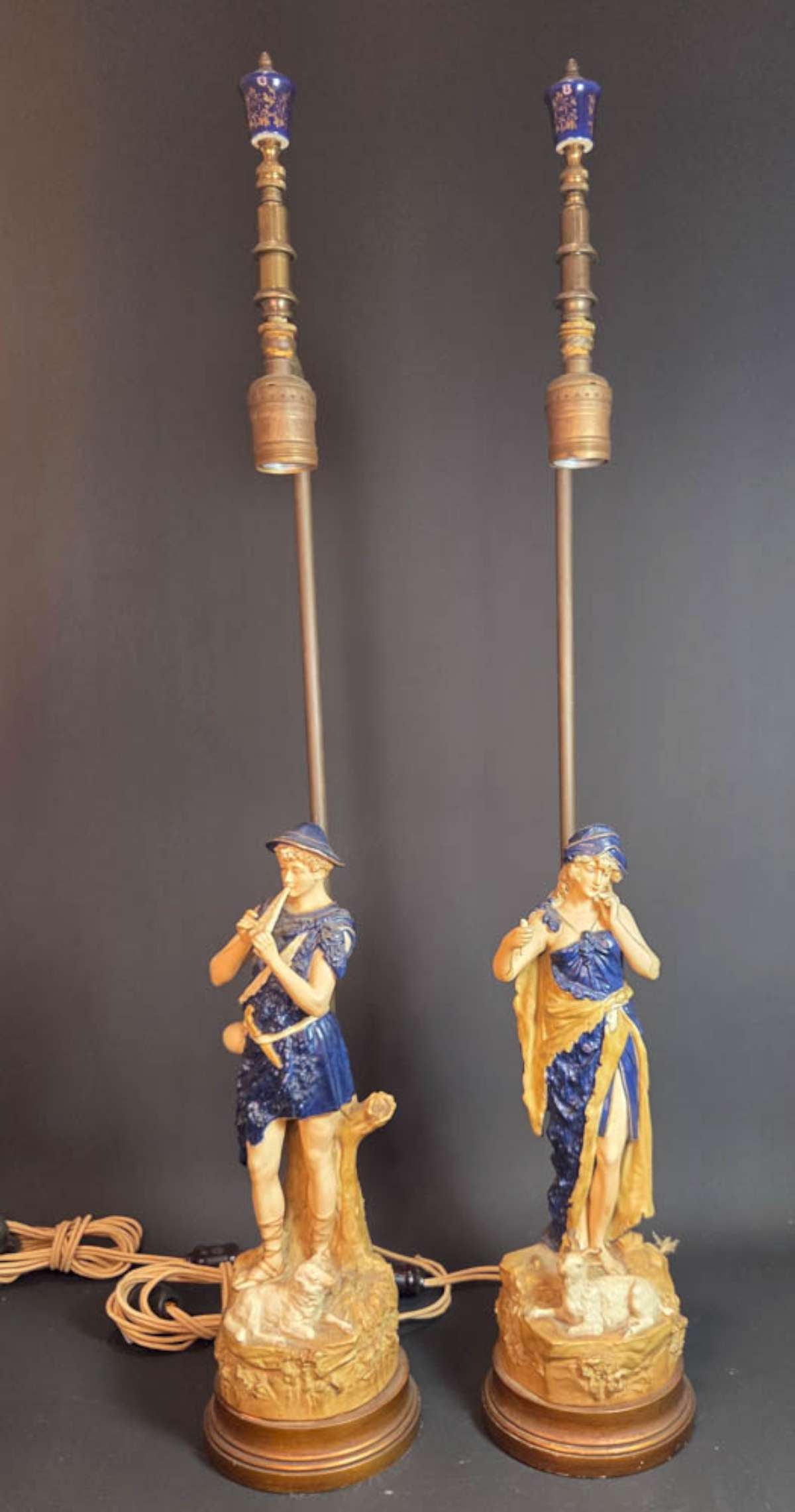 PAIR antique Royal Dux table lamps with animals: matching PAIR of antique porcelain figural statues made into electrified lamps and set on a brass base with felt underneath, so cannot see the maker's mark (they certainly look Czech and ve