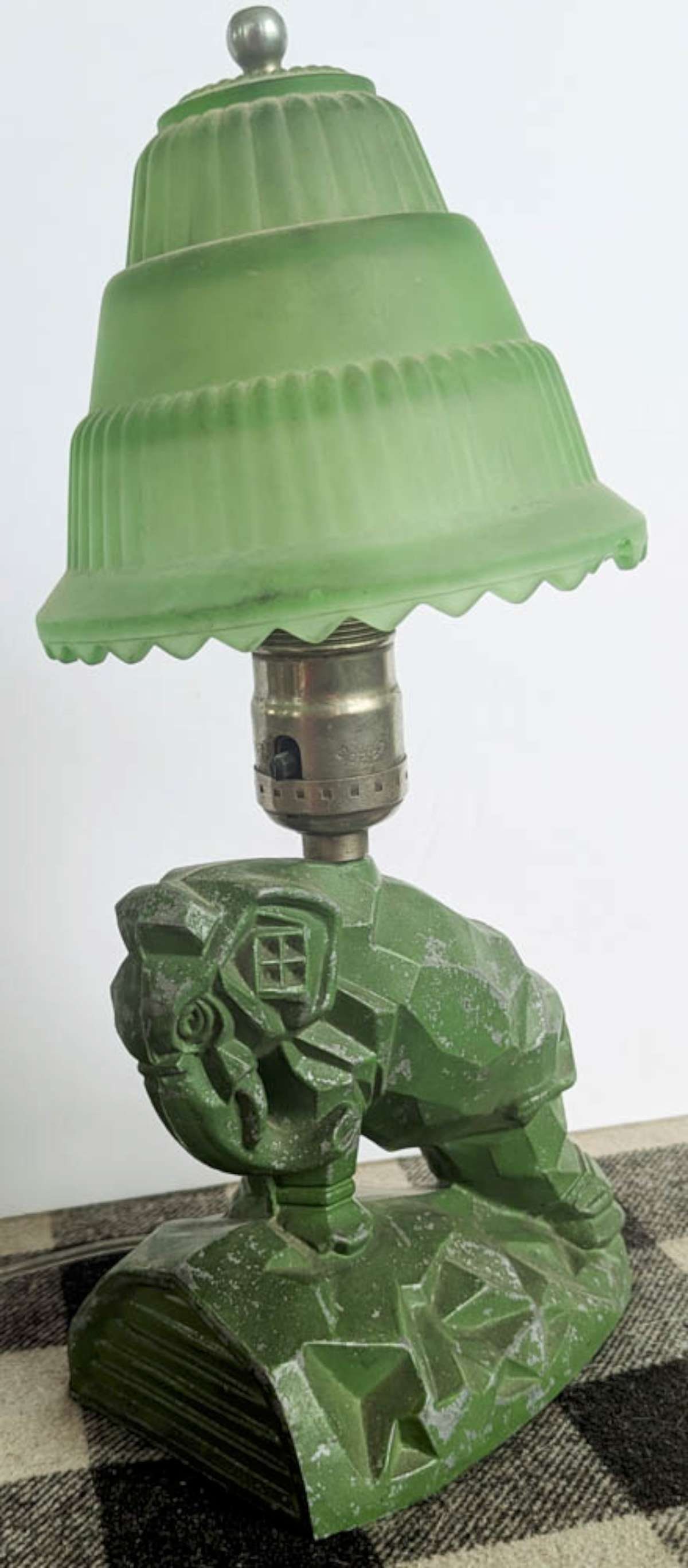 antique Art Deco figural animal table lamp: vintage or antique Art Deco period abstract Spelter or white pot metal elephant table or boudoir lamp with original green paint and matching green frosted stepped design shade