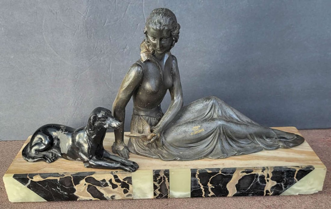 Art Deco period statue on marble - lady with dog: vintage or antique Art Deco period figural sculpture of a seated woman in a flowing dress with a dog lying beside her, all set on a marble base, the lady has a bronze finish and the dog a 
