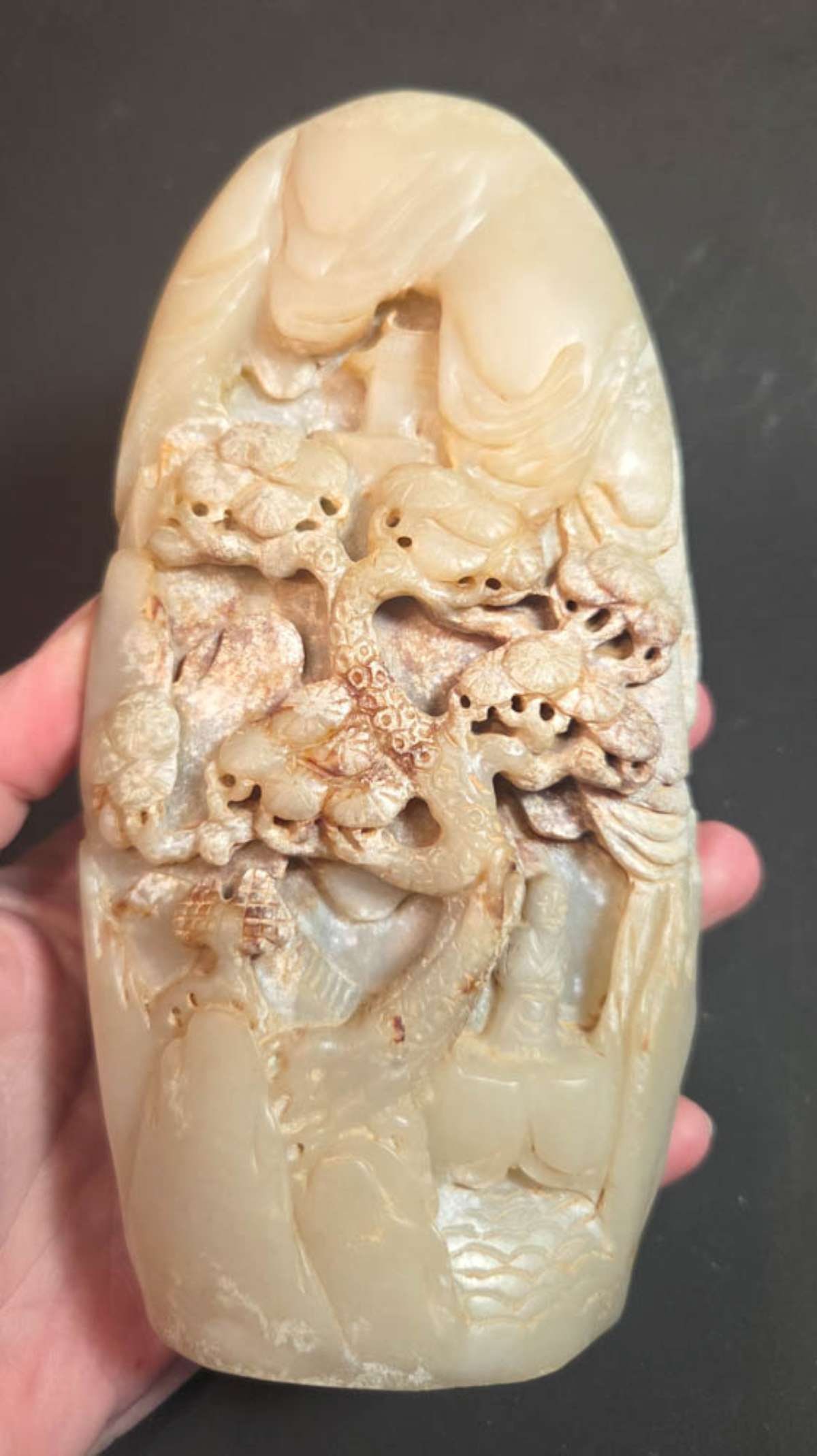 vintage Asian Jade carving floral pine tree: vintage or antique boulder Hetian Jade or possibly Chinese soapstone carved statue in a soft yellowish Celadon green and beige/brown tone and with a huge pine tree with flowers, houses and peopl