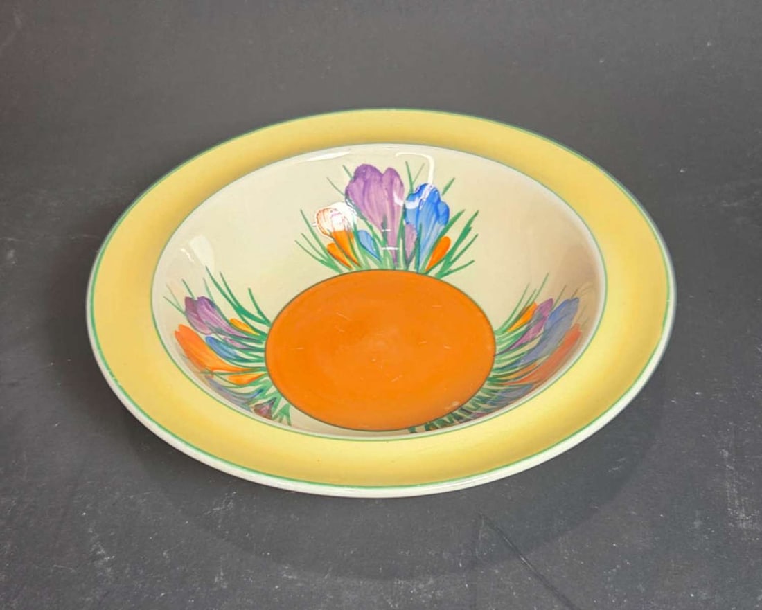 vintage Clarice Cliff Bizarre plate: vintage or antique English Royal Staffordshire pottery berry bowl or dish with hand painted floral or Crocus flower design by Clarice Cliff, A.J. Wilkinson Ltd Honeyglaze widest diameter about 6