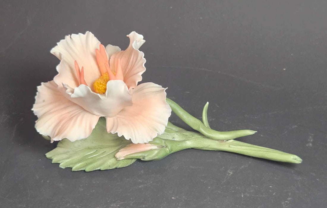 vintage bisque floral sculpture: vintage Bearded Iris salmon pink and white flower with green leaf and stem, unmarked but typical Italian Capodimonte style about 7" long by 3" high